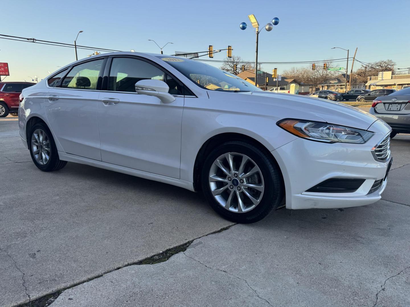 2017 WHITE /Black FORD FUSION (3FA6P0HD5HR) , located at 5900 E. Lancaster Ave., Fort Worth, TX, 76112, (817) 457-5456, 0.000000, 0.000000 - This is a 2017 FORD FUSION 4 DOOR SEDAN that is in excellent condition. There are no dents or scratches. The interior is clean with no rips or tears or stains. All power windows, door locks and seats. Ice cold AC for those hot Texas summer days. It is equipped with a CD player, AM/FM radio, AUX port - Photo#3