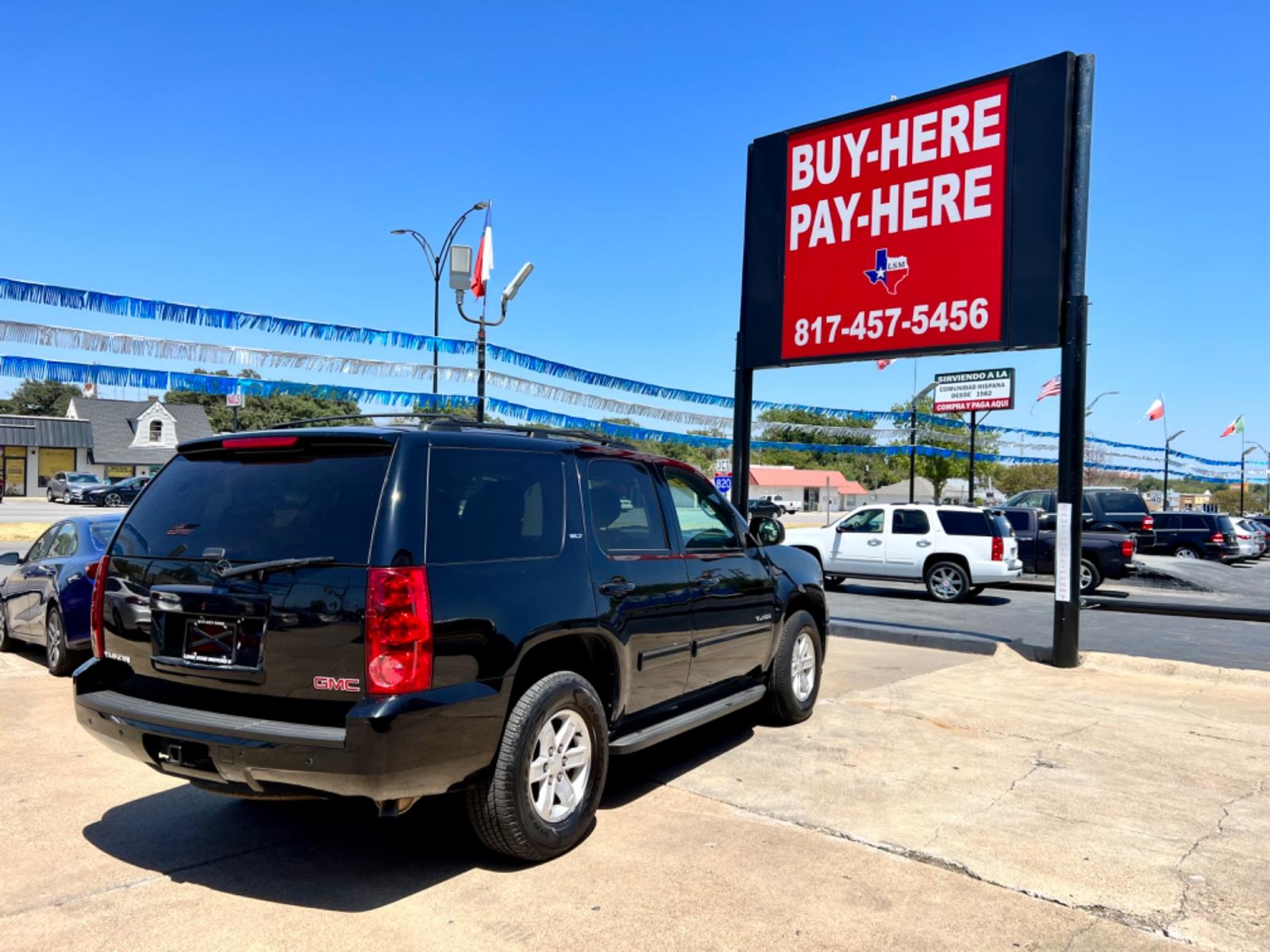2014 BLACK GMC YUKON (1GKS1CE03ER) , located at 5900 E. Lancaster Ave., Fort Worth, TX, 76112, (817) 457-5456, 0.000000, 0.000000 - This is a 2014 GMC YUKON 4 DOOR SUV that is in excellent condition. There are no dents or scratches. The interior is clean with no rips or tears or stains. All power windows, door locks and seats. Ice cold AC for those hot Texas summer days. It is equipped with a CD player, AM/FM radio, AUX port, Bl - Photo #6