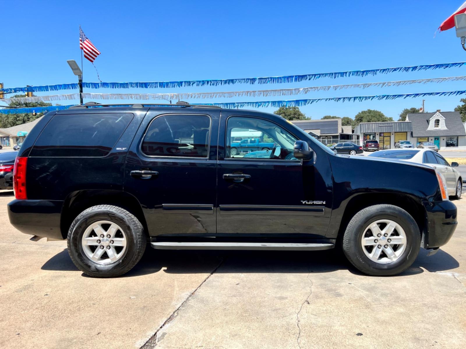 2014 BLACK GMC YUKON (1GKS1CE03ER) , located at 5900 E. Lancaster Ave., Fort Worth, TX, 76112, (817) 457-5456, 0.000000, 0.000000 - This is a 2014 GMC YUKON 4 DOOR SUV that is in excellent condition. There are no dents or scratches. The interior is clean with no rips or tears or stains. All power windows, door locks and seats. Ice cold AC for those hot Texas summer days. It is equipped with a CD player, AM/FM radio, AUX port, Bl - Photo #7