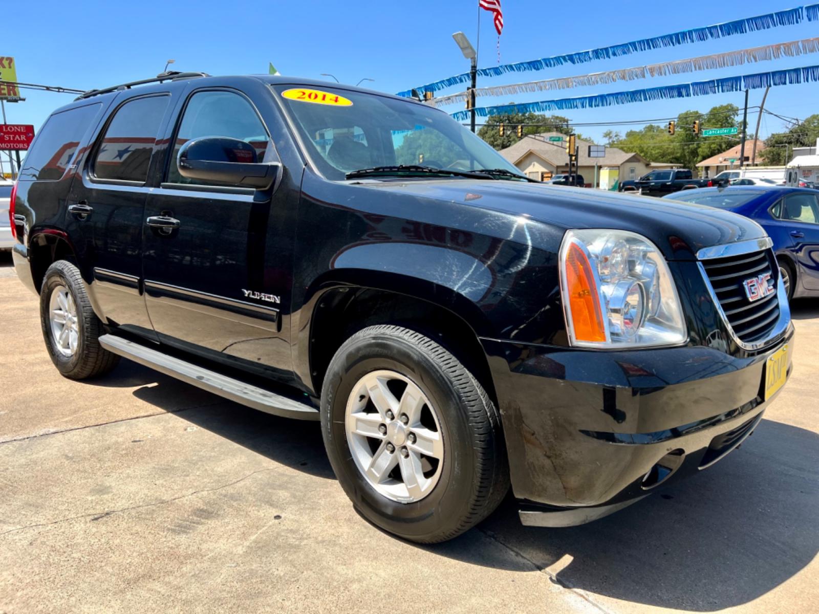 2014 BLACK GMC YUKON (1GKS1CE03ER) , located at 5900 E. Lancaster Ave., Fort Worth, TX, 76112, (817) 457-5456, 0.000000, 0.000000 - This is a 2014 GMC YUKON 4 DOOR SUV that is in excellent condition. There are no dents or scratches. The interior is clean with no rips or tears or stains. All power windows, door locks and seats. Ice cold AC for those hot Texas summer days. It is equipped with a CD player, AM/FM radio, AUX port, Bl - Photo #8