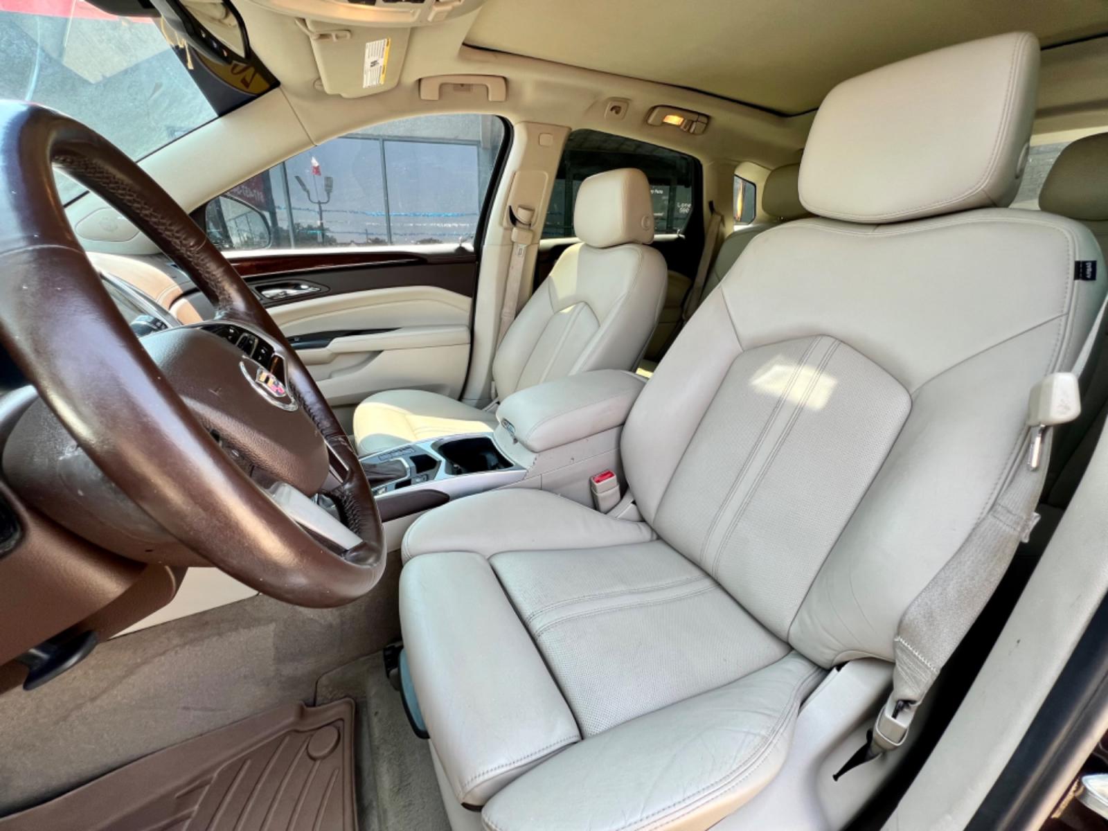 2015 BROWN CADILLAC SRX (3GYFNDE30FS) , located at 5900 E. Lancaster Ave., Fort Worth, TX, 76112, (817) 457-5456, 0.000000, 0.000000 - This is a 2015 CADILLAC SRX 4 DOOR SUV that is in excellent condition. There are no dents or scratches. The interior is clean with no rips or tears or stains. All power windows, door locks and seats. Ice cold AC for those hot Texas summer days. It is equipped with a CD player, AM/FM radio, AUX port, - Photo #10