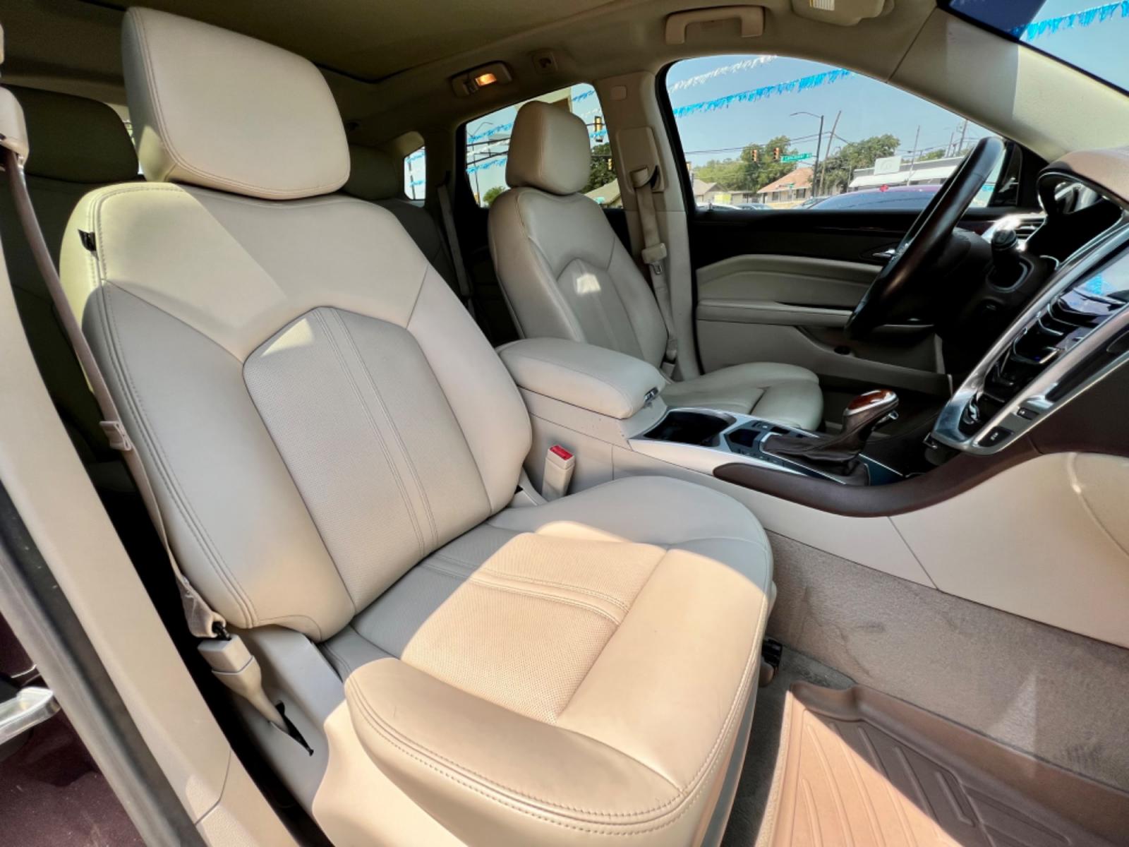 2015 BROWN CADILLAC SRX (3GYFNDE30FS) , located at 5900 E. Lancaster Ave., Fort Worth, TX, 76112, (817) 457-5456, 0.000000, 0.000000 - This is a 2015 CADILLAC SRX 4 DOOR SUV that is in excellent condition. There are no dents or scratches. The interior is clean with no rips or tears or stains. All power windows, door locks and seats. Ice cold AC for those hot Texas summer days. It is equipped with a CD player, AM/FM radio, AUX port, - Photo #16