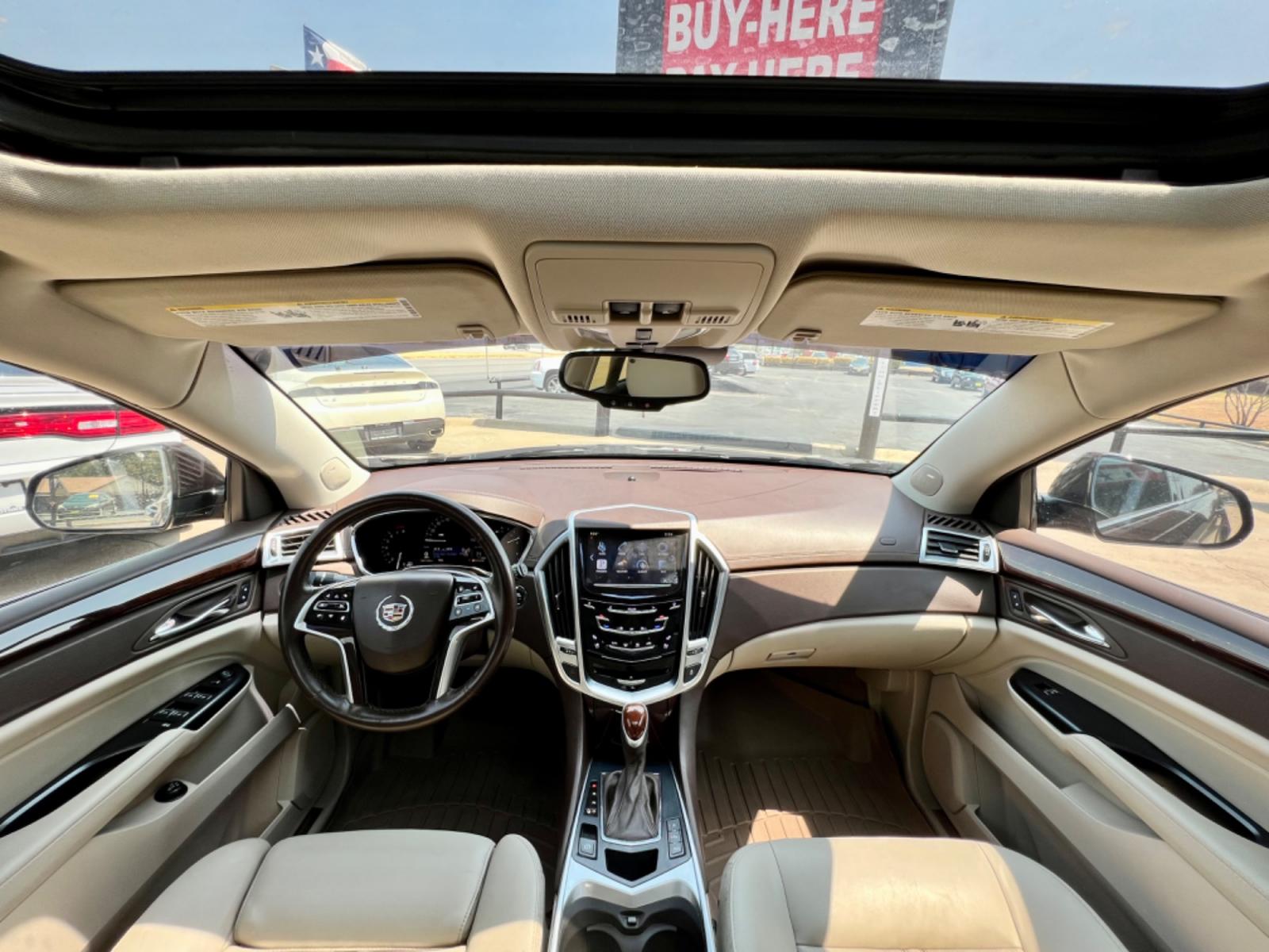2015 BROWN CADILLAC SRX (3GYFNDE30FS) , located at 5900 E. Lancaster Ave., Fort Worth, TX, 76112, (817) 457-5456, 0.000000, 0.000000 - This is a 2015 CADILLAC SRX 4 DOOR SUV that is in excellent condition. There are no dents or scratches. The interior is clean with no rips or tears or stains. All power windows, door locks and seats. Ice cold AC for those hot Texas summer days. It is equipped with a CD player, AM/FM radio, AUX port, - Photo #17
