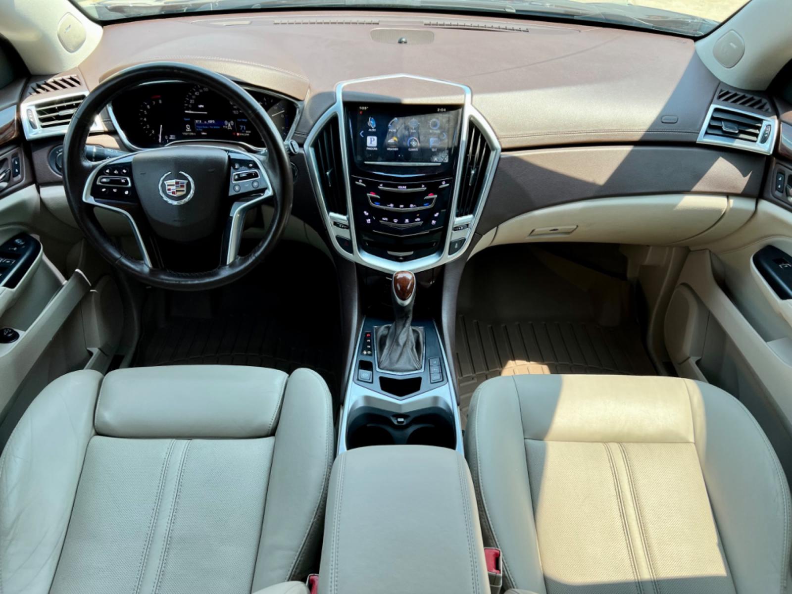 2015 BROWN CADILLAC SRX (3GYFNDE30FS) , located at 5900 E. Lancaster Ave., Fort Worth, TX, 76112, (817) 457-5456, 0.000000, 0.000000 - This is a 2015 CADILLAC SRX 4 DOOR SUV that is in excellent condition. There are no dents or scratches. The interior is clean with no rips or tears or stains. All power windows, door locks and seats. Ice cold AC for those hot Texas summer days. It is equipped with a CD player, AM/FM radio, AUX port, - Photo #18