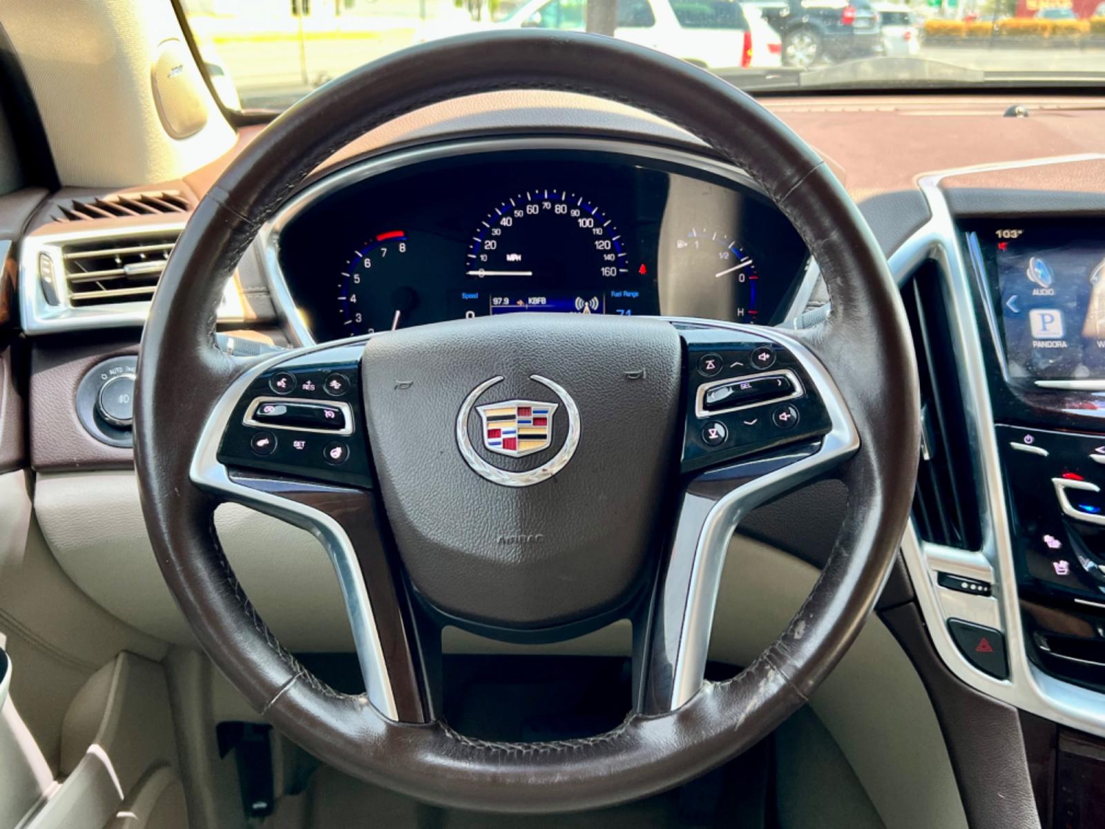 2015 BROWN CADILLAC SRX (3GYFNDE30FS) , located at 5900 E. Lancaster Ave., Fort Worth, TX, 76112, (817) 457-5456, 0.000000, 0.000000 - This is a 2015 CADILLAC SRX 4 DOOR SUV that is in excellent condition. There are no dents or scratches. The interior is clean with no rips or tears or stains. All power windows, door locks and seats. Ice cold AC for those hot Texas summer days. It is equipped with a CD player, AM/FM radio, AUX port, - Photo #19