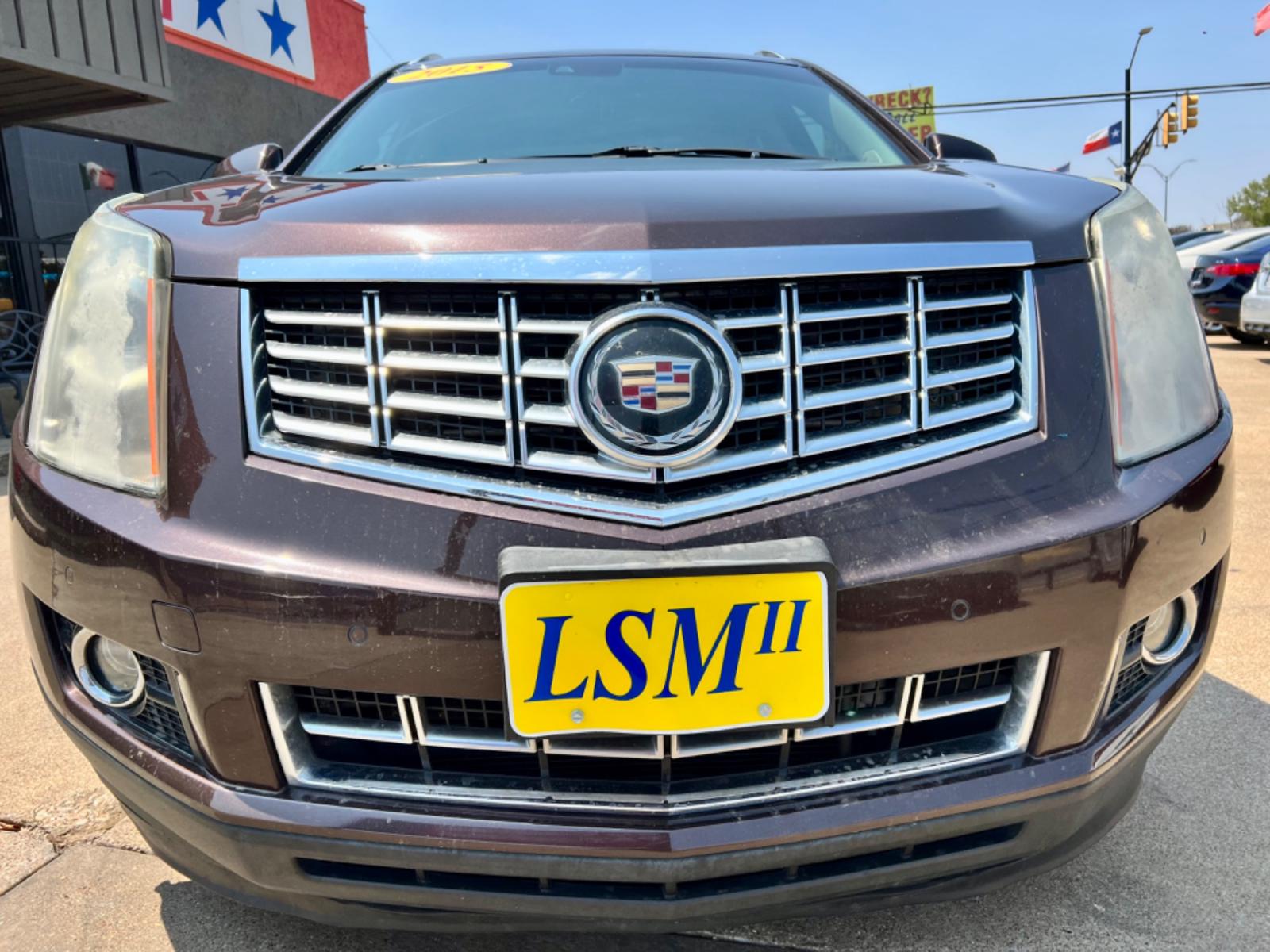 2015 BROWN CADILLAC SRX (3GYFNDE30FS) , located at 5900 E. Lancaster Ave., Fort Worth, TX, 76112, (817) 457-5456, 0.000000, 0.000000 - This is a 2015 CADILLAC SRX 4 DOOR SUV that is in excellent condition. There are no dents or scratches. The interior is clean with no rips or tears or stains. All power windows, door locks and seats. Ice cold AC for those hot Texas summer days. It is equipped with a CD player, AM/FM radio, AUX port, - Photo #2