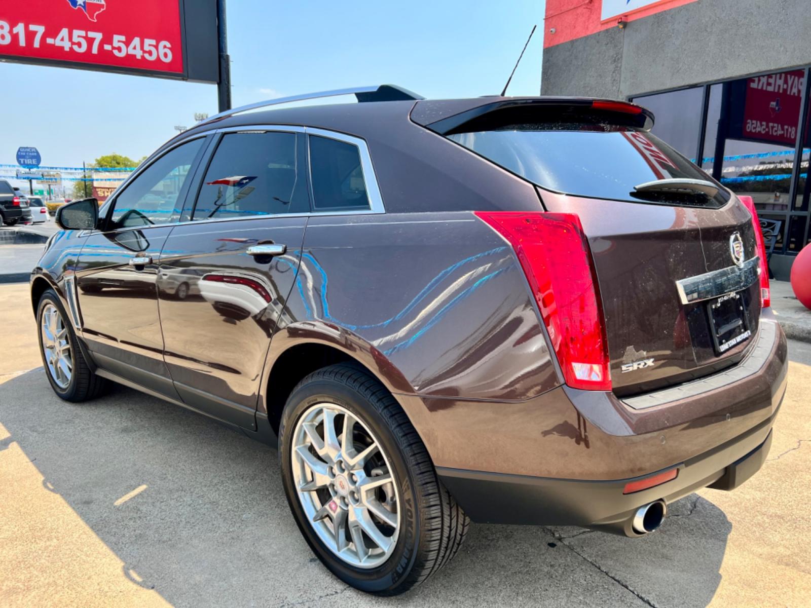 2015 BROWN CADILLAC SRX (3GYFNDE30FS) , located at 5900 E. Lancaster Ave., Fort Worth, TX, 76112, (817) 457-5456, 0.000000, 0.000000 - This is a 2015 CADILLAC SRX 4 DOOR SUV that is in excellent condition. There are no dents or scratches. The interior is clean with no rips or tears or stains. All power windows, door locks and seats. Ice cold AC for those hot Texas summer days. It is equipped with a CD player, AM/FM radio, AUX port, - Photo #4