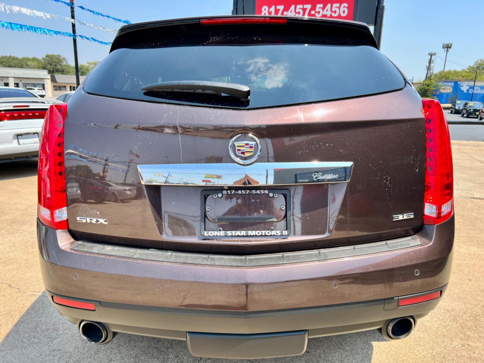 2015 BROWN CADILLAC SRX (3GYFNDE30FS) , located at 5900 E. Lancaster Ave., Fort Worth, TX, 76112, (817) 457-5456, 0.000000, 0.000000 - This is a 2015 CADILLAC SRX 4 DOOR SUV that is in excellent condition. There are no dents or scratches. The interior is clean with no rips or tears or stains. All power windows, door locks and seats. Ice cold AC for those hot Texas summer days. It is equipped with a CD player, AM/FM radio, AUX port, - Photo #5