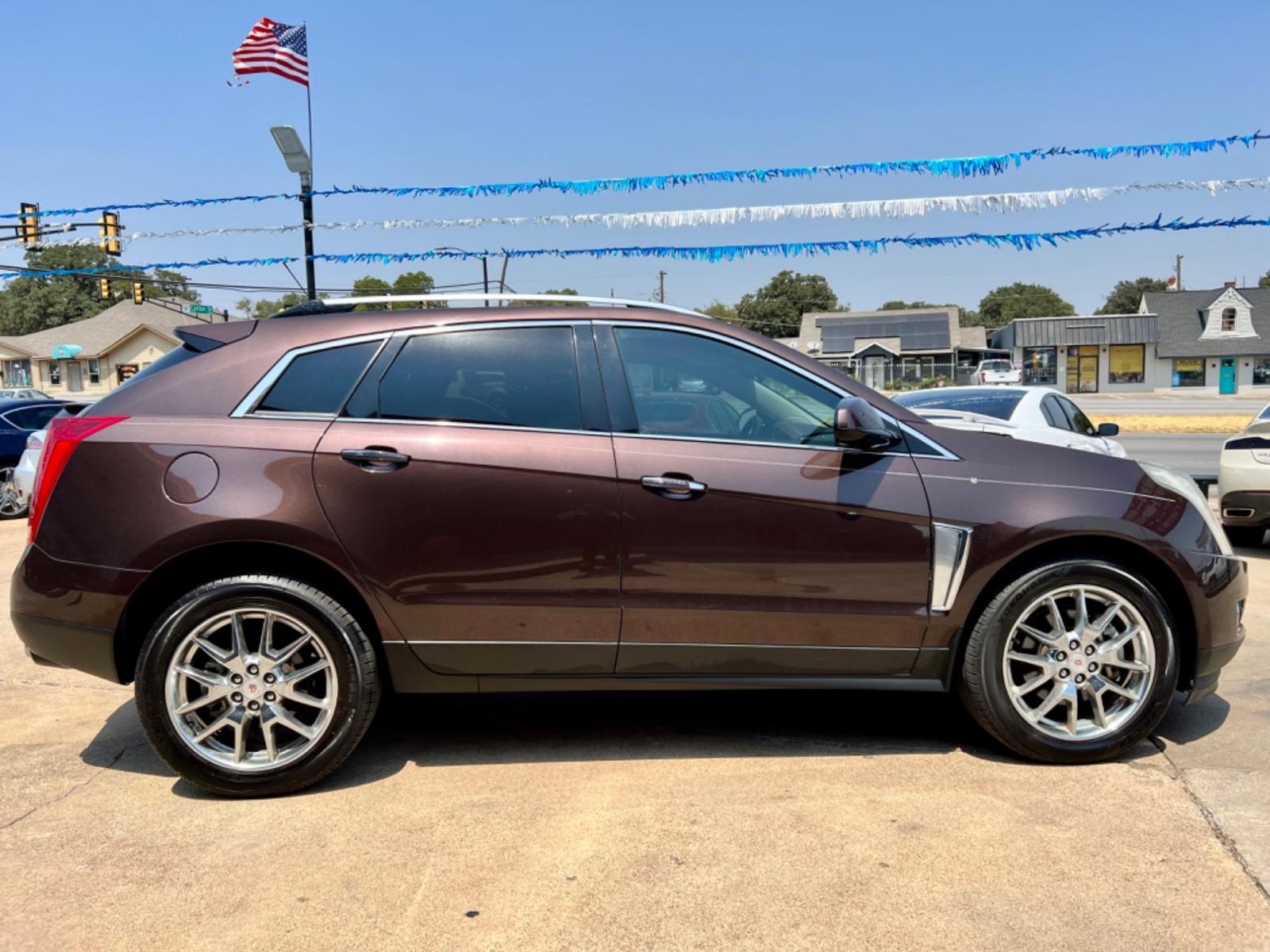 2015 BROWN CADILLAC SRX (3GYFNDE30FS) , located at 5900 E. Lancaster Ave., Fort Worth, TX, 76112, (817) 457-5456, 0.000000, 0.000000 - This is a 2015 CADILLAC SRX 4 DOOR SUV that is in excellent condition. There are no dents or scratches. The interior is clean with no rips or tears or stains. All power windows, door locks and seats. Ice cold AC for those hot Texas summer days. It is equipped with a CD player, AM/FM radio, AUX port, - Photo #7