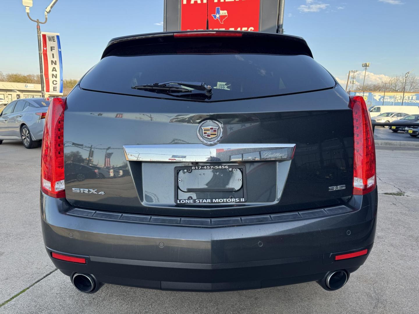 2014 GRAY CADILLAC SRX (3GYFNEE37ES) , located at 5900 E. Lancaster Ave., Fort Worth, TX, 76112, (817) 457-5456, 0.000000, 0.000000 - This is a 2014 CADILLAC SRX 4 DOOR SUV that is in excellent condition. There are no dents or scratches. The interior is clean with no rips or tears or stains. All power windows, door locks and seats. Ice cold AC for those hot Texas summer days. It is equipped with a CD player, AM/FM radio, AUX port, - Photo#5