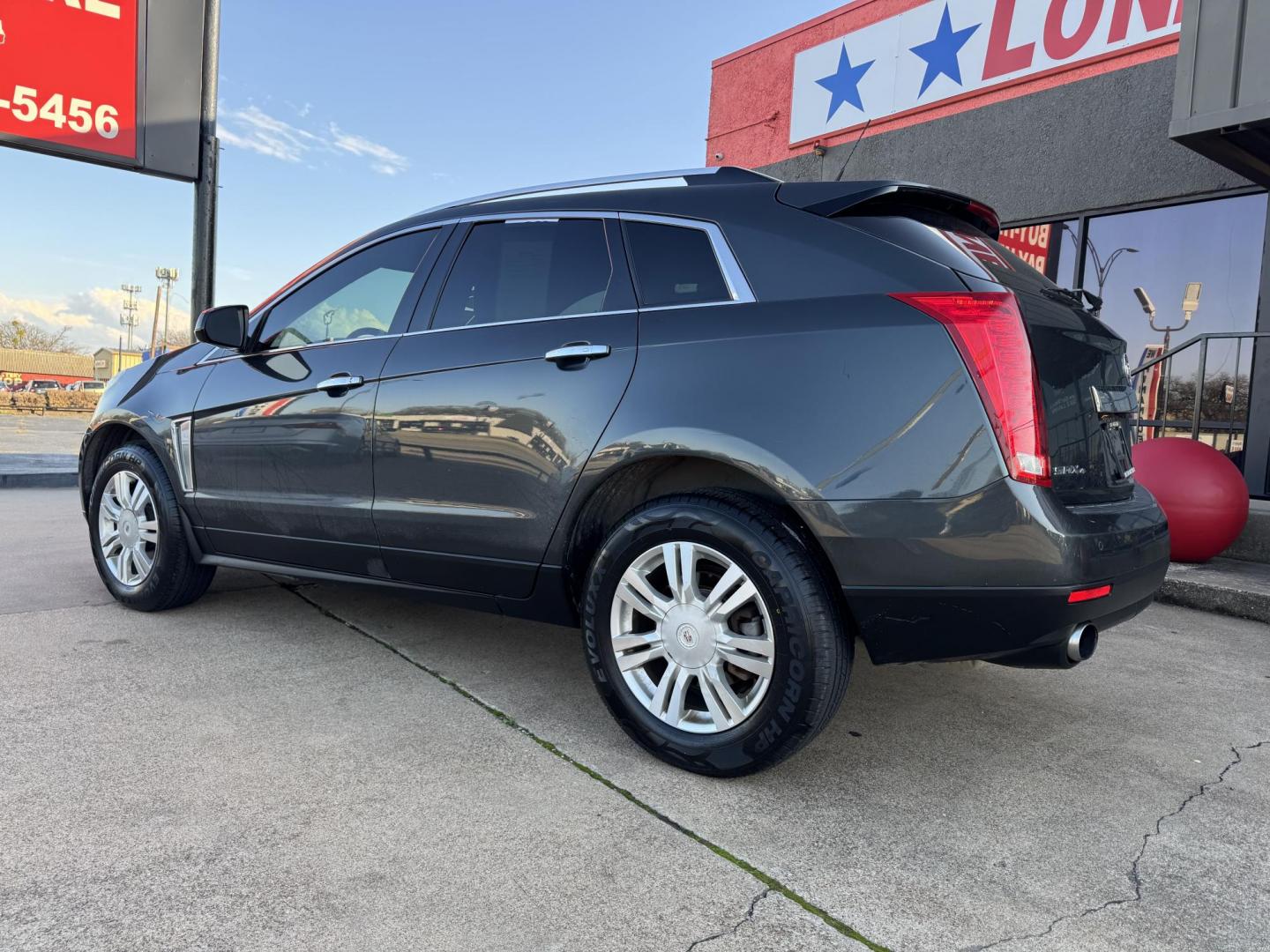 2014 GRAY CADILLAC SRX (3GYFNEE37ES) , located at 5900 E. Lancaster Ave., Fort Worth, TX, 76112, (817) 457-5456, 0.000000, 0.000000 - This is a 2014 CADILLAC SRX 4 DOOR SUV that is in excellent condition. There are no dents or scratches. The interior is clean with no rips or tears or stains. All power windows, door locks and seats. Ice cold AC for those hot Texas summer days. It is equipped with a CD player, AM/FM radio, AUX port, - Photo#7