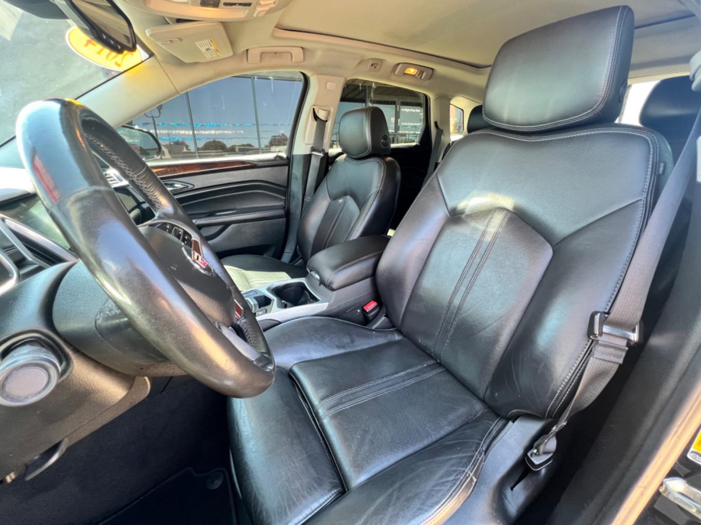 2014 GRAY CADILLAC SRX (3GYFNEE37ES) , located at 5900 E. Lancaster Ave., Fort Worth, TX, 76112, (817) 457-5456, 0.000000, 0.000000 - This is a 2014 CADILLAC SRX 4 DOOR SUV that is in excellent condition. There are no dents or scratches. The interior is clean with no rips or tears or stains. All power windows, door locks and seats. Ice cold AC for those hot Texas summer days. It is equipped with a CD player, AM/FM radio, AUX port, - Photo#10