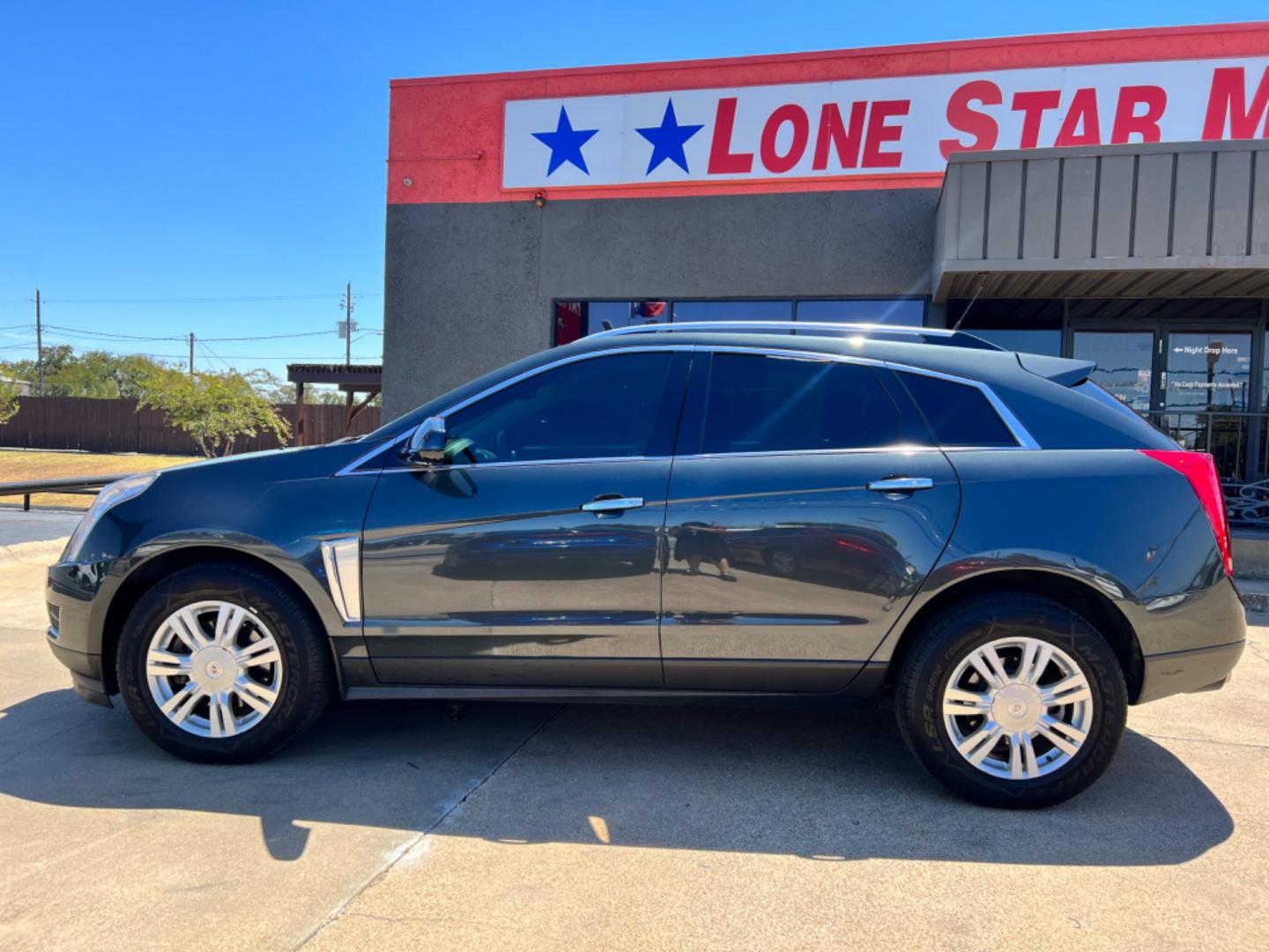 2014 GRAY CADILLAC SRX (3GYFNEE37ES) , located at 5900 E. Lancaster Ave., Fort Worth, TX, 76112, (817) 457-5456, 0.000000, 0.000000 - This is a 2014 CADILLAC SRX 4 DOOR SUV that is in excellent condition. There are no dents or scratches. The interior is clean with no rips or tears or stains. All power windows, door locks and seats. Ice cold AC for those hot Texas summer days. It is equipped with a CD player, AM/FM radio, AUX port, - Photo#3