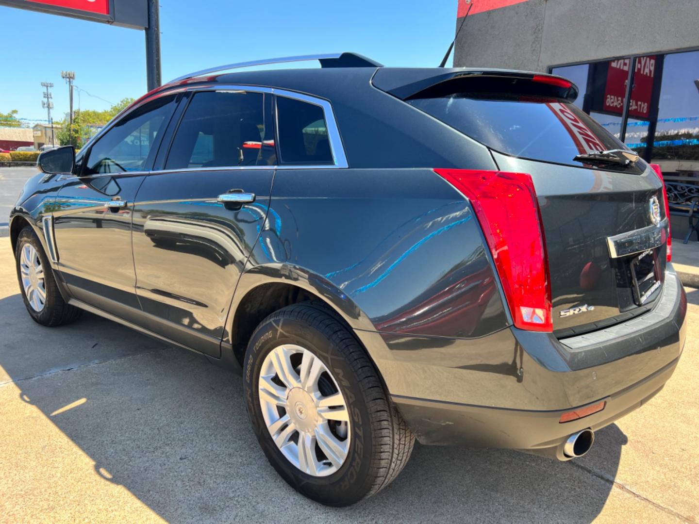 2014 GRAY CADILLAC SRX (3GYFNEE37ES) , located at 5900 E. Lancaster Ave., Fort Worth, TX, 76112, (817) 457-5456, 0.000000, 0.000000 - This is a 2014 CADILLAC SRX 4 DOOR SUV that is in excellent condition. There are no dents or scratches. The interior is clean with no rips or tears or stains. All power windows, door locks and seats. Ice cold AC for those hot Texas summer days. It is equipped with a CD player, AM/FM radio, AUX port, - Photo#4