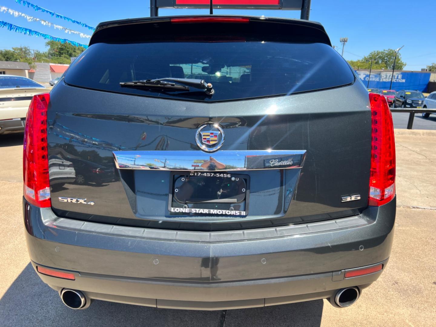 2014 GRAY CADILLAC SRX (3GYFNEE37ES) , located at 5900 E. Lancaster Ave., Fort Worth, TX, 76112, (817) 457-5456, 0.000000, 0.000000 - This is a 2014 CADILLAC SRX 4 DOOR SUV that is in excellent condition. There are no dents or scratches. The interior is clean with no rips or tears or stains. All power windows, door locks and seats. Ice cold AC for those hot Texas summer days. It is equipped with a CD player, AM/FM radio, AUX port, - Photo#5