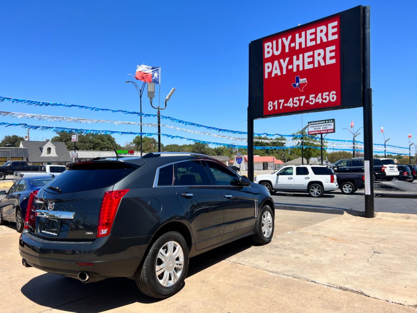 2014 GRAY CADILLAC SRX (3GYFNEE37ES) , located at 5900 E. Lancaster Ave., Fort Worth, TX, 76112, (817) 457-5456, 0.000000, 0.000000 - This is a 2014 CADILLAC SRX 4 DOOR SUV that is in excellent condition. There are no dents or scratches. The interior is clean with no rips or tears or stains. All power windows, door locks and seats. Ice cold AC for those hot Texas summer days. It is equipped with a CD player, AM/FM radio, AUX port, - Photo#6