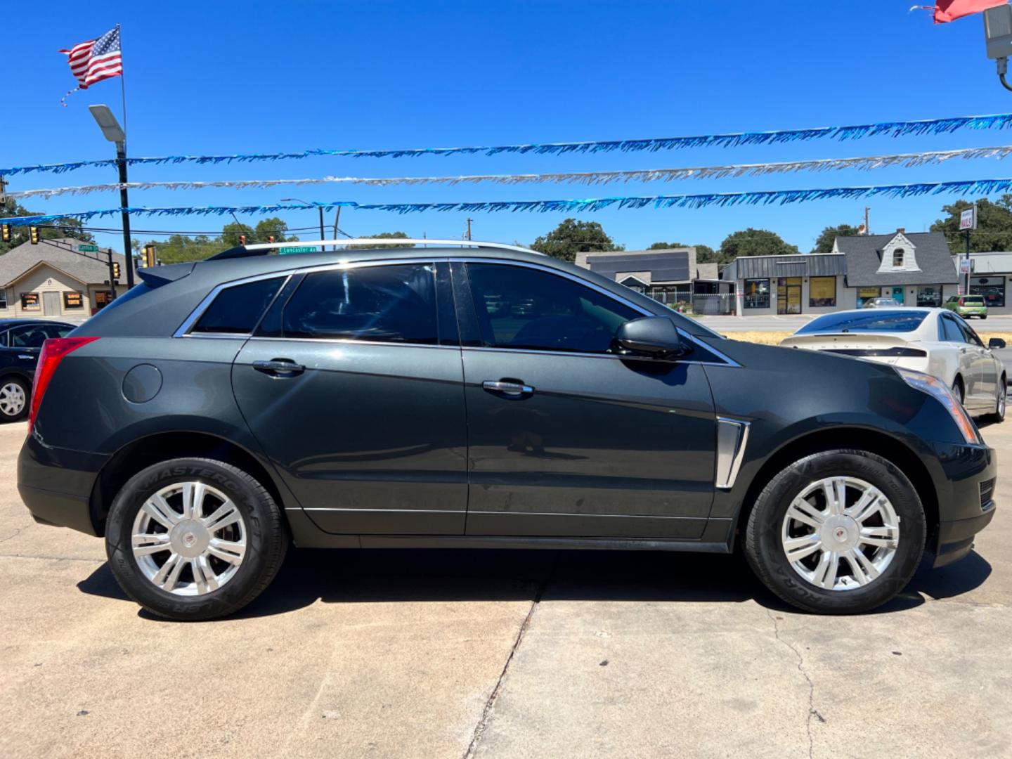 2014 GRAY CADILLAC SRX (3GYFNEE37ES) , located at 5900 E. Lancaster Ave., Fort Worth, TX, 76112, (817) 457-5456, 0.000000, 0.000000 - This is a 2014 CADILLAC SRX 4 DOOR SUV that is in excellent condition. There are no dents or scratches. The interior is clean with no rips or tears or stains. All power windows, door locks and seats. Ice cold AC for those hot Texas summer days. It is equipped with a CD player, AM/FM radio, AUX port, - Photo#7