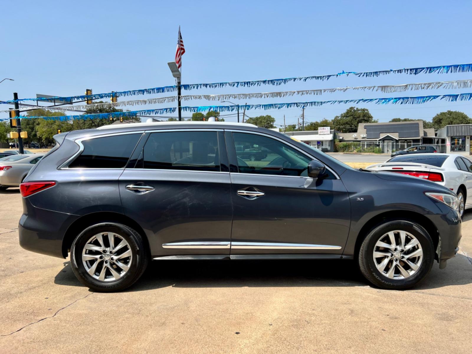 2014 GRAY INFINITI QX60 (5N1AL0MN1EC) , located at 5900 E. Lancaster Ave., Fort Worth, TX, 76112, (817) 457-5456, 0.000000, 0.000000 - This is a 2014 INFINITI QX60 4 DOOR SUV that is in excellent condition. There are no dents or scratches. The interior is clean with no rips or tears or stains. All power windows, door locks and seats. Ice cold AC for those hot Texas summer days. It is equipped with a CD player, AM/FM radio, AUX port - Photo #7