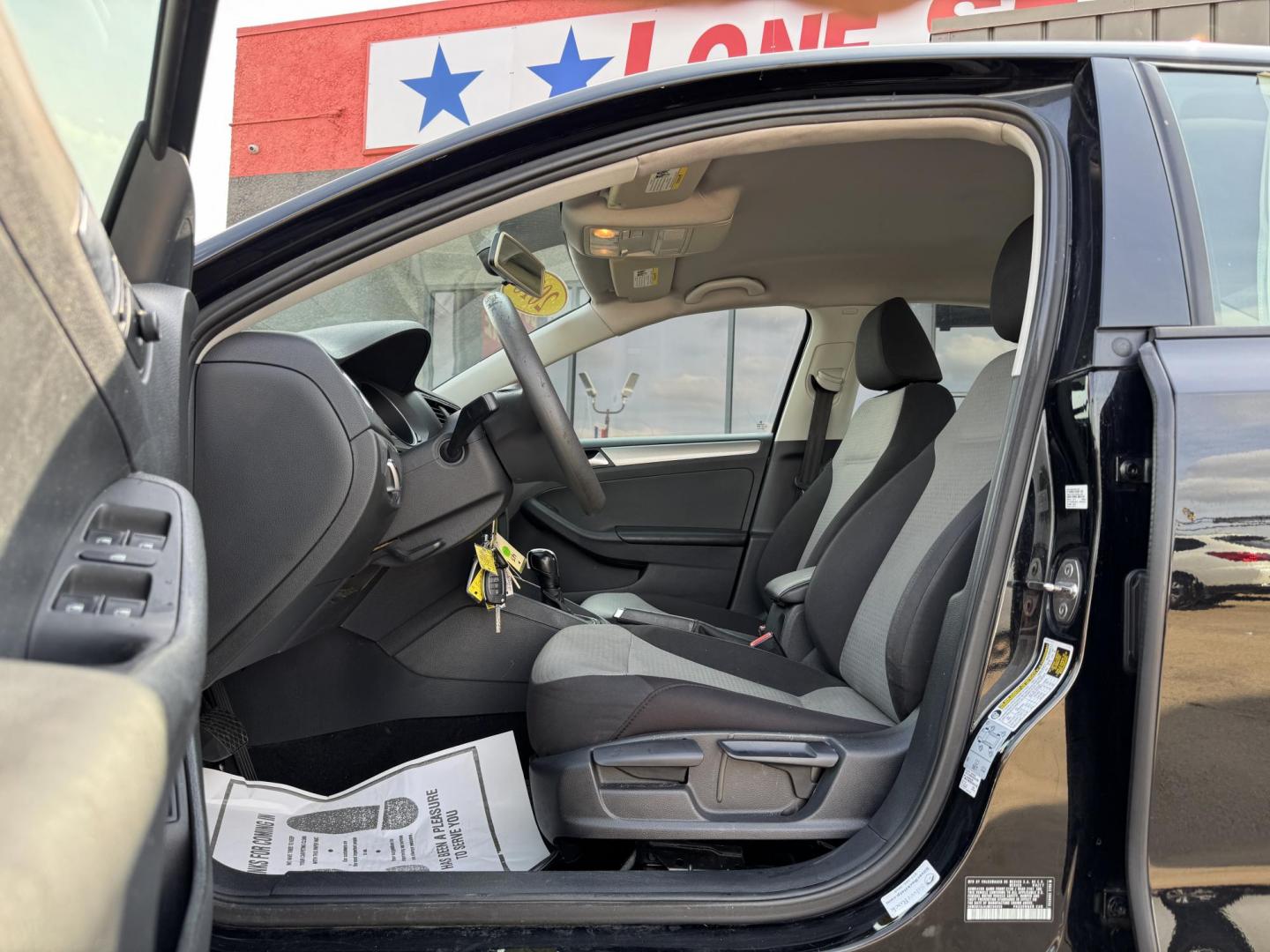 2018 BLACK /GRAY VOLKSWAGEN JETTA 1.4T S (3VW2B7AJ4JM) , located at 5900 E. Lancaster Ave., Fort Worth, TX, 76112, (817) 457-5456, 0.000000, 0.000000 - This is a 2018 VOLKSWAGEN JETTA 4 DR SEDAN. All power windows, door locks and seats. Ice cold AC for those hot Texas summer days. It is equipped with a CD player, AM/FM radio, AUX port, Bluetooth connectivity and Sirius XM radio capability. It runs and drives like new. The tires are like new with pl - Photo#8