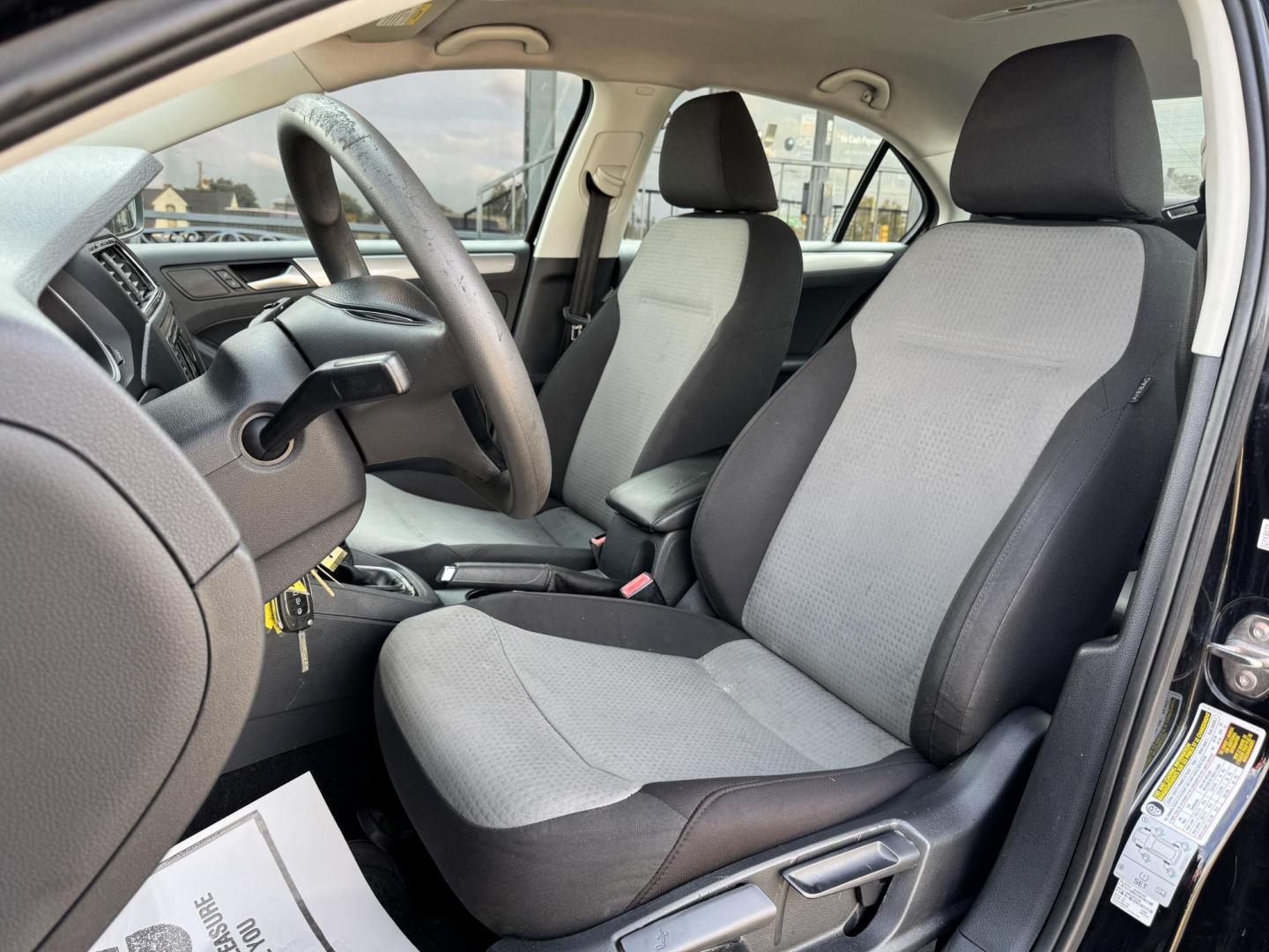 2018 BLACK /GRAY VOLKSWAGEN JETTA 1.4T S (3VW2B7AJ4JM) , located at 5900 E. Lancaster Ave., Fort Worth, TX, 76112, (817) 457-5456, 0.000000, 0.000000 - This is a 2018 VOLKSWAGEN JETTA 4 DR SEDAN. All power windows, door locks and seats. Ice cold AC for those hot Texas summer days. It is equipped with a CD player, AM/FM radio, AUX port, Bluetooth connectivity and Sirius XM radio capability. It runs and drives like new. The tires are like new with pl - Photo#9