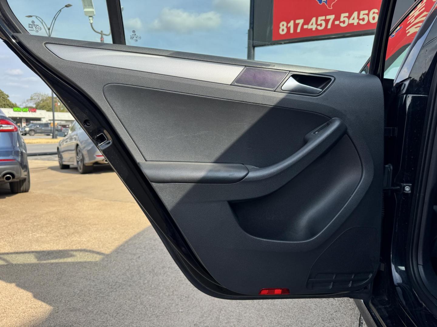 2018 BLACK /GRAY VOLKSWAGEN JETTA 1.4T S (3VW2B7AJ4JM) , located at 5900 E. Lancaster Ave., Fort Worth, TX, 76112, (817) 457-5456, 0.000000, 0.000000 - This is a 2018 VOLKSWAGEN JETTA 4 DR SEDAN. All power windows, door locks and seats. Ice cold AC for those hot Texas summer days. It is equipped with a CD player, AM/FM radio, AUX port, Bluetooth connectivity and Sirius XM radio capability. It runs and drives like new. The tires are like new with pl - Photo#10