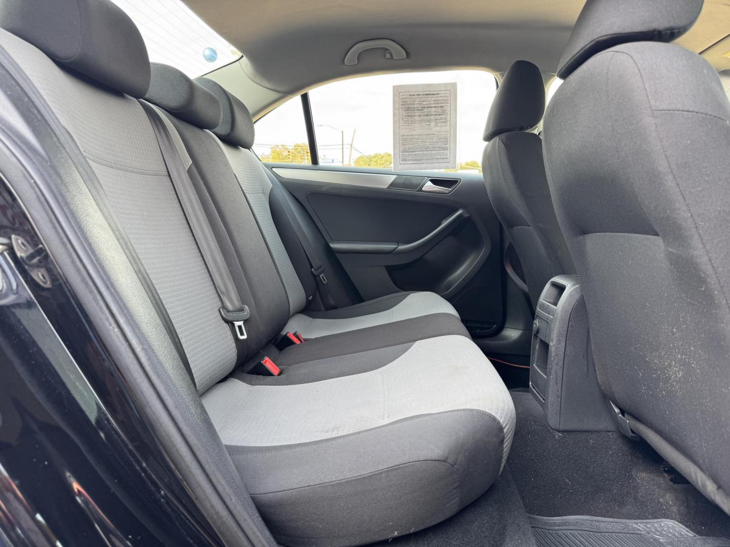 2018 BLACK /GRAY VOLKSWAGEN JETTA 1.4T S (3VW2B7AJ4JM) , located at 5900 E. Lancaster Ave., Fort Worth, TX, 76112, (817) 457-5456, 0.000000, 0.000000 - This is a 2018 VOLKSWAGEN JETTA 4 DR SEDAN. All power windows, door locks and seats. Ice cold AC for those hot Texas summer days. It is equipped with a CD player, AM/FM radio, AUX port, Bluetooth connectivity and Sirius XM radio capability. It runs and drives like new. The tires are like new with pl - Photo#13