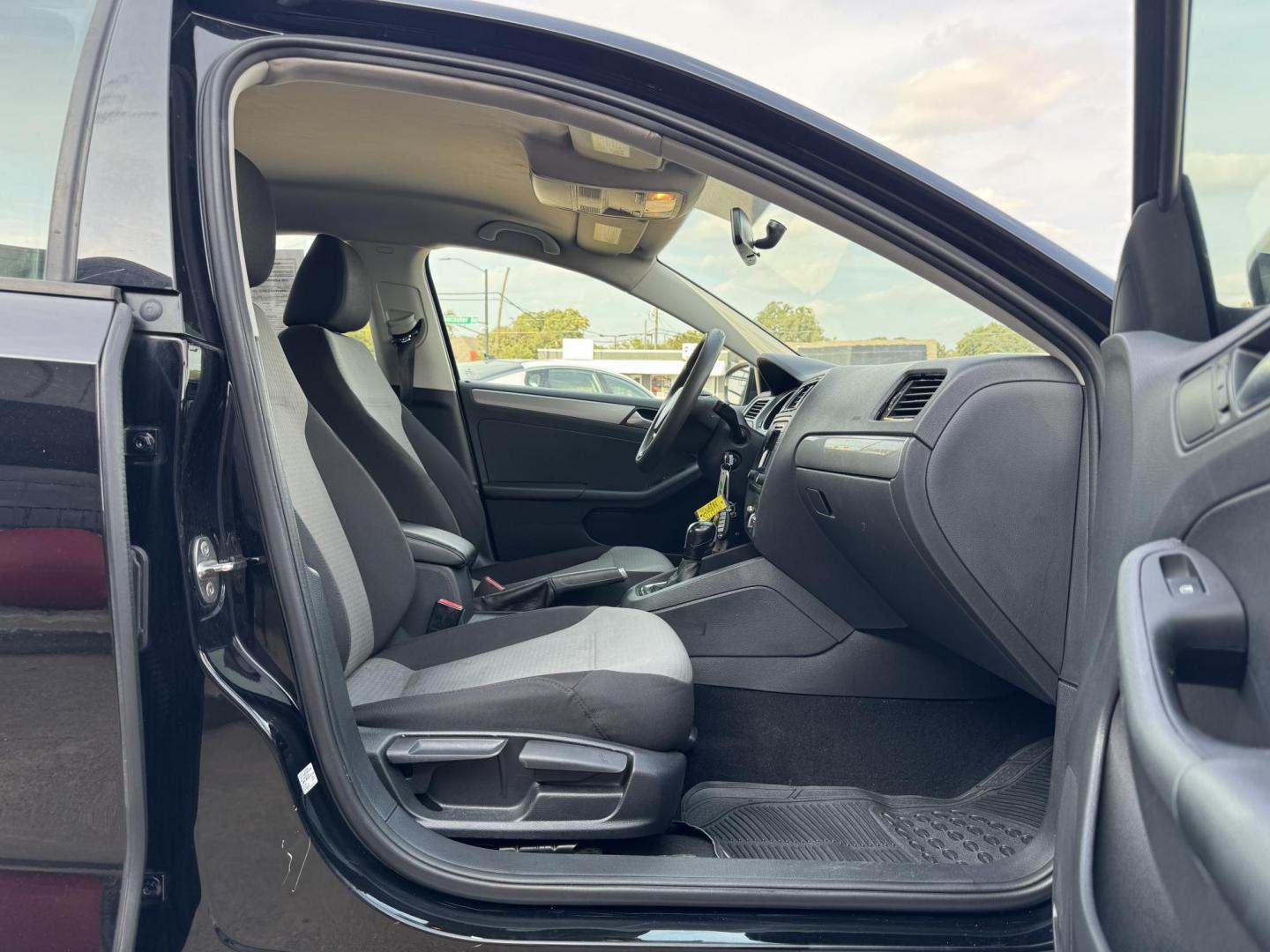 2018 BLACK /GRAY VOLKSWAGEN JETTA 1.4T S (3VW2B7AJ4JM) , located at 5900 E. Lancaster Ave., Fort Worth, TX, 76112, (817) 457-5456, 0.000000, 0.000000 - This is a 2018 VOLKSWAGEN JETTA 4 DR SEDAN. All power windows, door locks and seats. Ice cold AC for those hot Texas summer days. It is equipped with a CD player, AM/FM radio, AUX port, Bluetooth connectivity and Sirius XM radio capability. It runs and drives like new. The tires are like new with pl - Photo#15