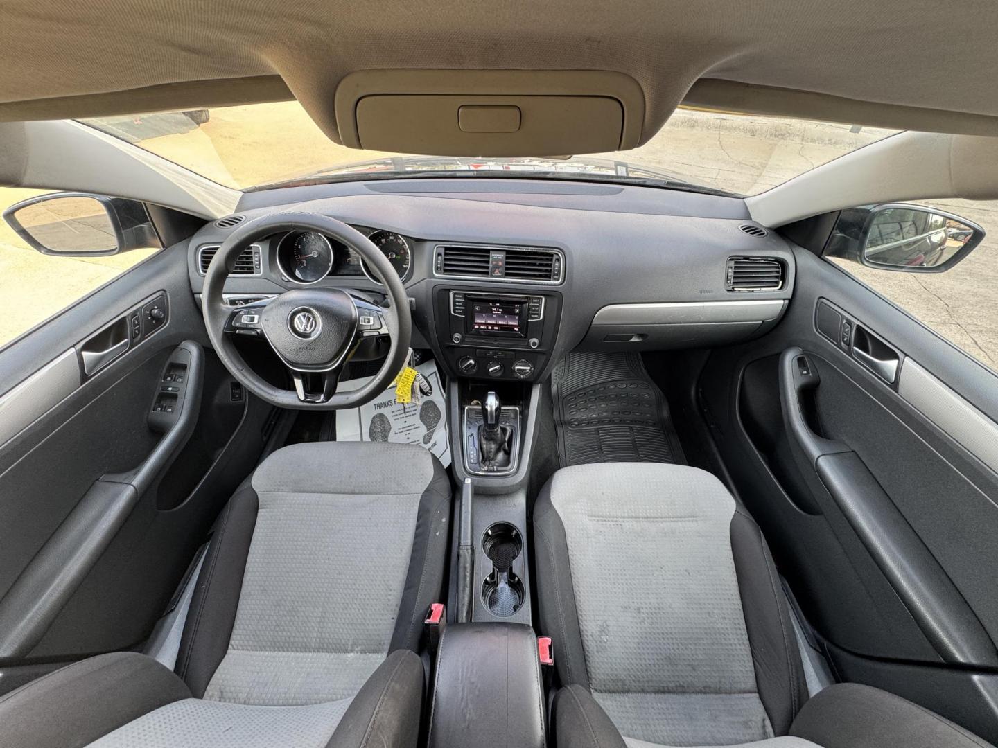 2018 BLACK /GRAY VOLKSWAGEN JETTA 1.4T S (3VW2B7AJ4JM) , located at 5900 E. Lancaster Ave., Fort Worth, TX, 76112, (817) 457-5456, 0.000000, 0.000000 - This is a 2018 VOLKSWAGEN JETTA 4 DR SEDAN. All power windows, door locks and seats. Ice cold AC for those hot Texas summer days. It is equipped with a CD player, AM/FM radio, AUX port, Bluetooth connectivity and Sirius XM radio capability. It runs and drives like new. The tires are like new with pl - Photo#17