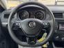 2018 BLACK /GRAY VOLKSWAGEN JETTA 1.4T S (3VW2B7AJ4JM) , located at 5900 E. Lancaster Ave., Fort Worth, TX, 76112, (817) 457-5456, 0.000000, 0.000000 - This is a 2018 VOLKSWAGEN JETTA 4 DR SEDAN. All power windows, door locks and seats. Ice cold AC for those hot Texas summer days. It is equipped with a CD player, AM/FM radio, AUX port, Bluetooth connectivity and Sirius XM radio capability. It runs and drives like new. The tires are like new with pl - Photo#18