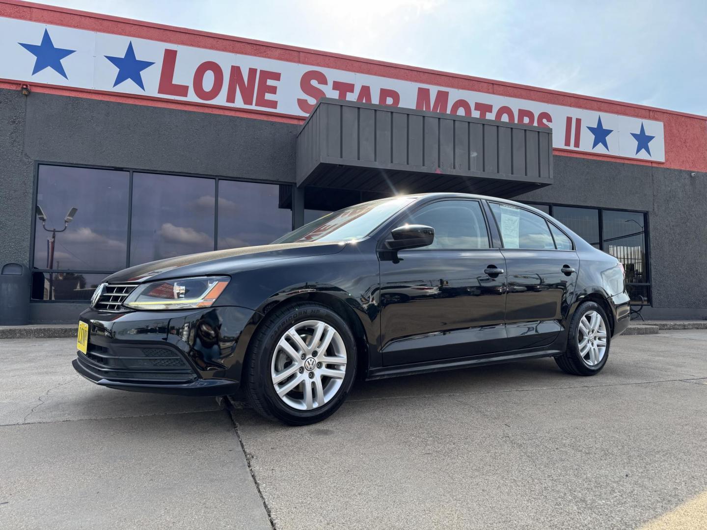 2018 BLACK /GRAY VOLKSWAGEN JETTA 1.4T S (3VW2B7AJ4JM) , located at 5900 E. Lancaster Ave., Fort Worth, TX, 76112, (817) 457-5456, 0.000000, 0.000000 - This is a 2018 VOLKSWAGEN JETTA 4 DR SEDAN. All power windows, door locks and seats. Ice cold AC for those hot Texas summer days. It is equipped with a CD player, AM/FM radio, AUX port, Bluetooth connectivity and Sirius XM radio capability. It runs and drives like new. The tires are like new with pl - Photo#0