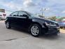 2018 BLACK /GRAY VOLKSWAGEN JETTA 1.4T S (3VW2B7AJ4JM) , located at 5900 E. Lancaster Ave., Fort Worth, TX, 76112, (817) 457-5456, 0.000000, 0.000000 - This is a 2018 VOLKSWAGEN JETTA 4 DR SEDAN. All power windows, door locks and seats. Ice cold AC for those hot Texas summer days. It is equipped with a CD player, AM/FM radio, AUX port, Bluetooth connectivity and Sirius XM radio capability. It runs and drives like new. The tires are like new with pl - Photo#2