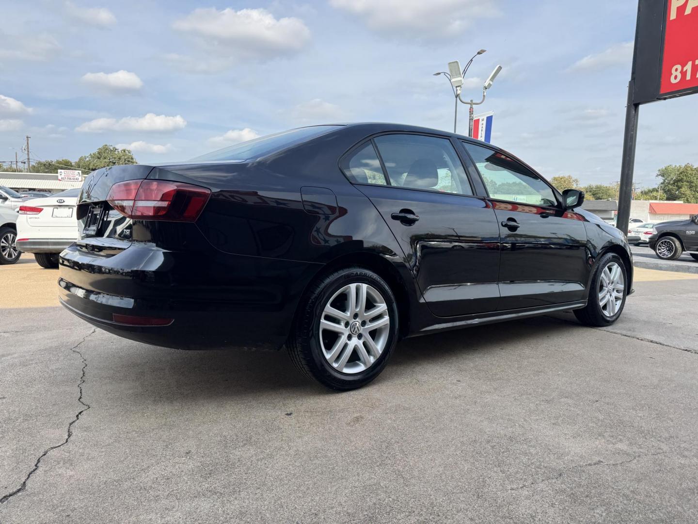 2018 BLACK /GRAY VOLKSWAGEN JETTA 1.4T S (3VW2B7AJ4JM) , located at 5900 E. Lancaster Ave., Fort Worth, TX, 76112, (817) 457-5456, 0.000000, 0.000000 - This is a 2018 VOLKSWAGEN JETTA 4 DR SEDAN. All power windows, door locks and seats. Ice cold AC for those hot Texas summer days. It is equipped with a CD player, AM/FM radio, AUX port, Bluetooth connectivity and Sirius XM radio capability. It runs and drives like new. The tires are like new with pl - Photo#3