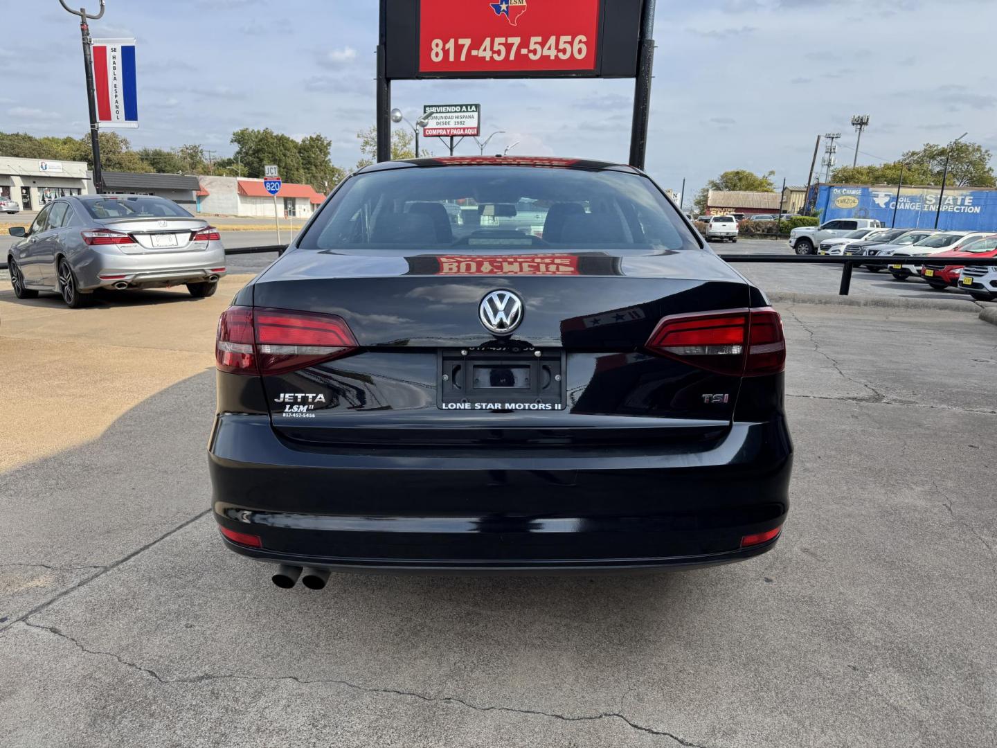 2018 BLACK /GRAY VOLKSWAGEN JETTA 1.4T S (3VW2B7AJ4JM) , located at 5900 E. Lancaster Ave., Fort Worth, TX, 76112, (817) 457-5456, 0.000000, 0.000000 - This is a 2018 VOLKSWAGEN JETTA 4 DR SEDAN. All power windows, door locks and seats. Ice cold AC for those hot Texas summer days. It is equipped with a CD player, AM/FM radio, AUX port, Bluetooth connectivity and Sirius XM radio capability. It runs and drives like new. The tires are like new with pl - Photo#4
