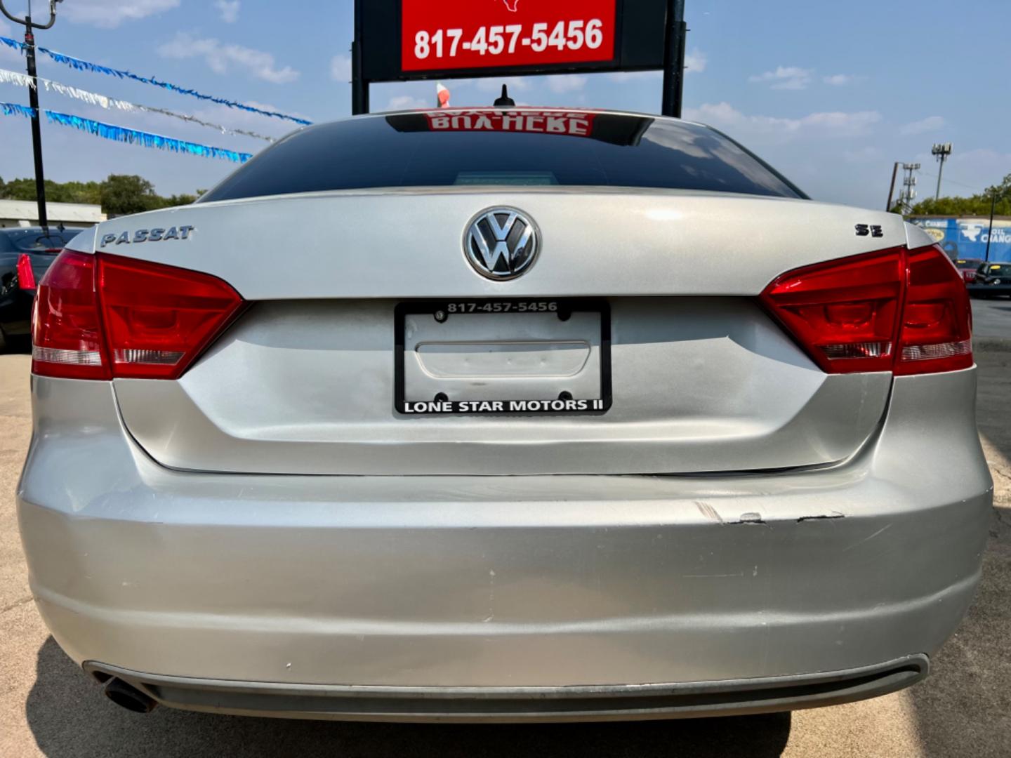 2013 SILVER /Black VOLKSWAGEN PASSAT (1VWBP7A32DC) , located at 5900 E. Lancaster Ave., Fort Worth, TX, 76112, (817) 457-5456, 0.000000, 0.000000 - CASH CAR ONLY, NO FINANCING AVAILABLE. WE'VE SLASHED THE PRICE! NOW ONLY $5,391! THIS 2013 VOLKSWAGEN PASSAT 4 DOOR SEDAN RUNS AND DRIVES GREAT. IT IS EQUIPPED WITH A CD PLAYER, AM/FM RADIO AND AN AUX PORT. THE TIRES ARE IN GOOD CONDITION AND STILL HAVE TREAD LEFT ON THEM. THIS CAR WILL NOT LAST S - Photo#5