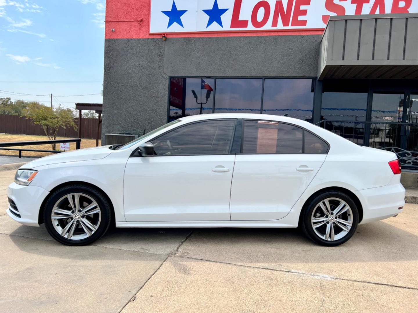 2015 WHITE VOLKSWAGEN JETTA (3VW2K7AJ1FM) , located at 5900 E. Lancaster Ave., Fort Worth, TX, 76112, (817) 457-5456, 0.000000, 0.000000 - This is a 2015 VOLKSWAGEN JETTA 4 DOOR SEDAN that is in excellent condition. There are no dents or scratches. The interior is clean with no rips or tears or stains. All power windows, door locks and seats. Ice cold AC for those hot Texas summer days. It is equipped with a CD player, AM/FM radio, AUX - Photo#3