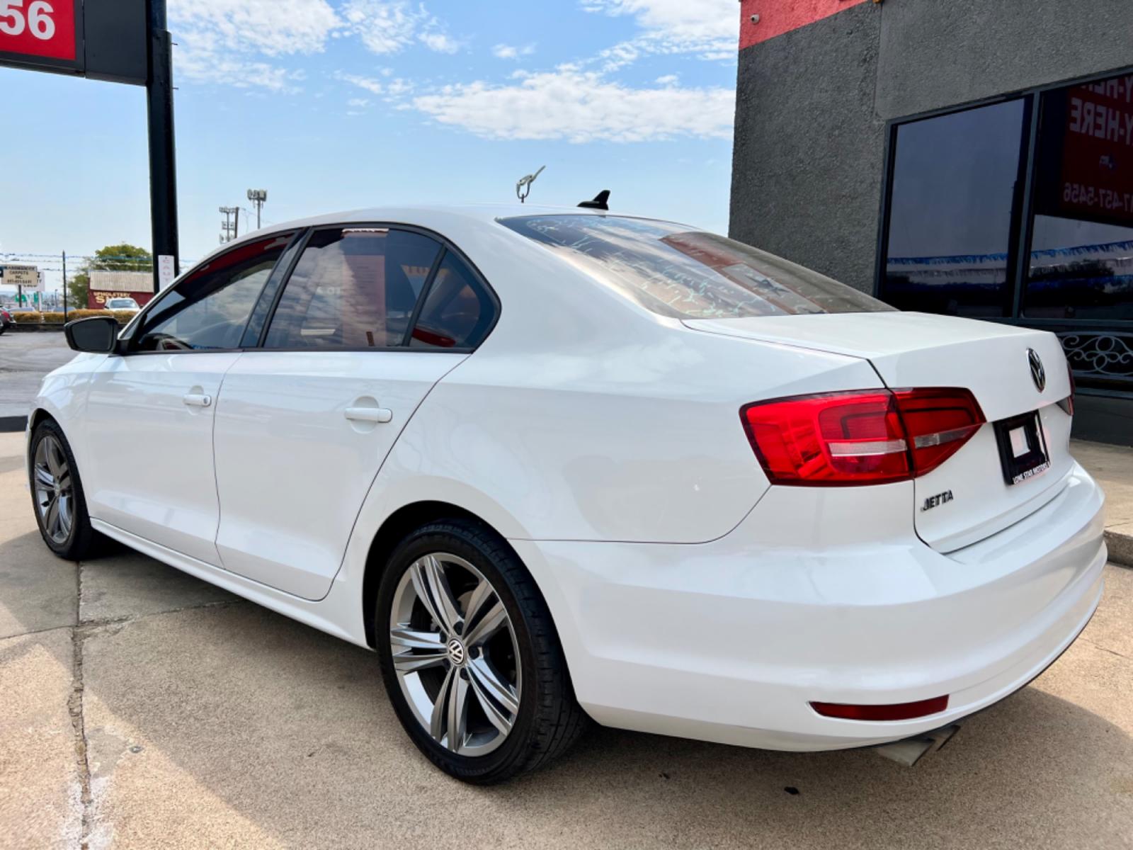 2015 WHITE VOLKSWAGEN JETTA (3VW2K7AJ1FM) , located at 5900 E. Lancaster Ave., Fort Worth, TX, 76112, (817) 457-5456, 0.000000, 0.000000 - This is a 2015 VOLKSWAGEN JETTA 4 DOOR SEDAN that is in excellent condition. There are no dents or scratches. The interior is clean with no rips or tears or stains. All power windows, door locks and seats. Ice cold AC for those hot Texas summer days. It is equipped with a CD player, AM/FM radio, AUX - Photo #4