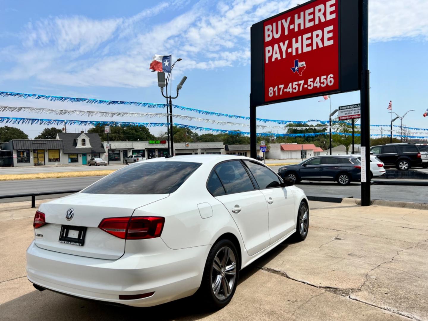 2015 WHITE VOLKSWAGEN JETTA (3VW2K7AJ1FM) , located at 5900 E. Lancaster Ave., Fort Worth, TX, 76112, (817) 457-5456, 0.000000, 0.000000 - This is a 2015 VOLKSWAGEN JETTA 4 DOOR SEDAN that is in excellent condition. There are no dents or scratches. The interior is clean with no rips or tears or stains. All power windows, door locks and seats. Ice cold AC for those hot Texas summer days. It is equipped with a CD player, AM/FM radio, AUX - Photo#6