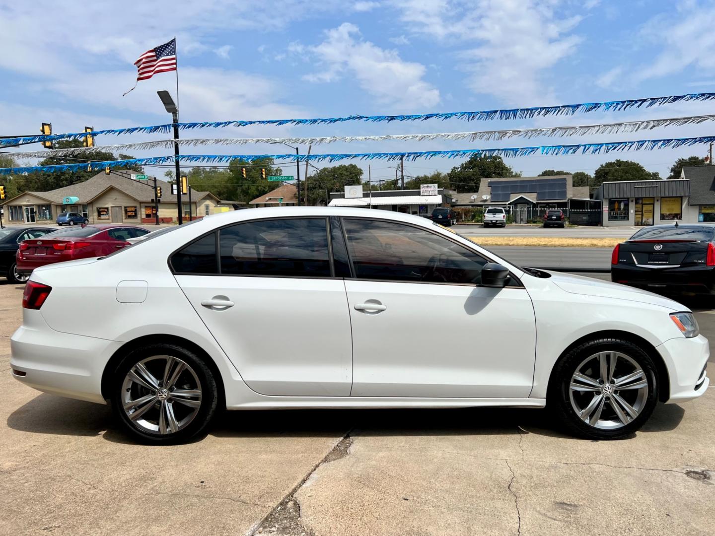 2015 WHITE VOLKSWAGEN JETTA (3VW2K7AJ1FM) , located at 5900 E. Lancaster Ave., Fort Worth, TX, 76112, (817) 457-5456, 0.000000, 0.000000 - This is a 2015 VOLKSWAGEN JETTA 4 DOOR SEDAN that is in excellent condition. There are no dents or scratches. The interior is clean with no rips or tears or stains. All power windows, door locks and seats. Ice cold AC for those hot Texas summer days. It is equipped with a CD player, AM/FM radio, AUX - Photo#7