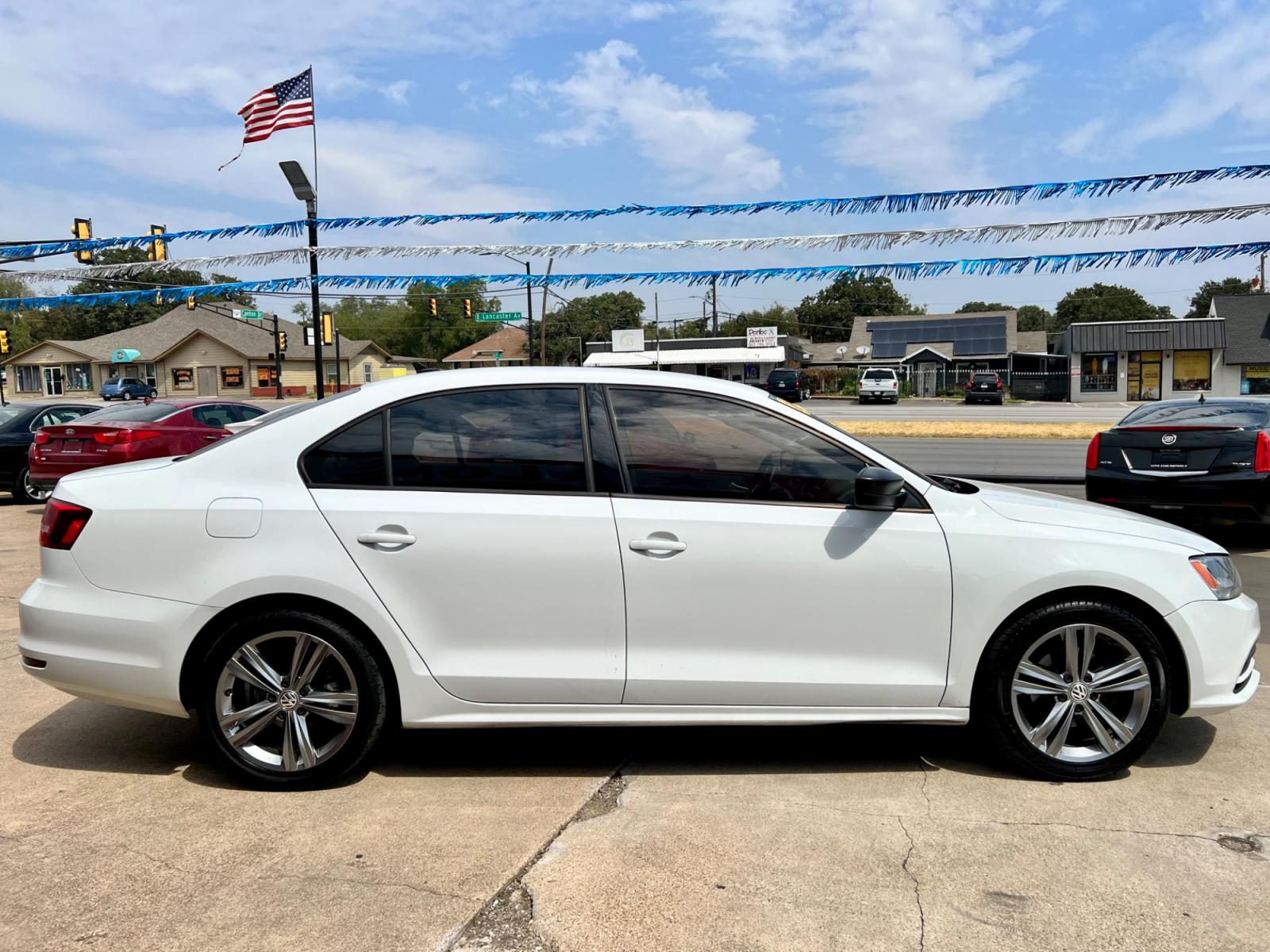2015 WHITE VOLKSWAGEN JETTA (3VW2K7AJ1FM) , located at 5900 E. Lancaster Ave., Fort Worth, TX, 76112, (817) 457-5456, 0.000000, 0.000000 - This is a 2015 VOLKSWAGEN JETTA 4 DOOR SEDAN that is in excellent condition. There are no dents or scratches. The interior is clean with no rips or tears or stains. All power windows, door locks and seats. Ice cold AC for those hot Texas summer days. It is equipped with a CD player, AM/FM radio, AUX - Photo #7