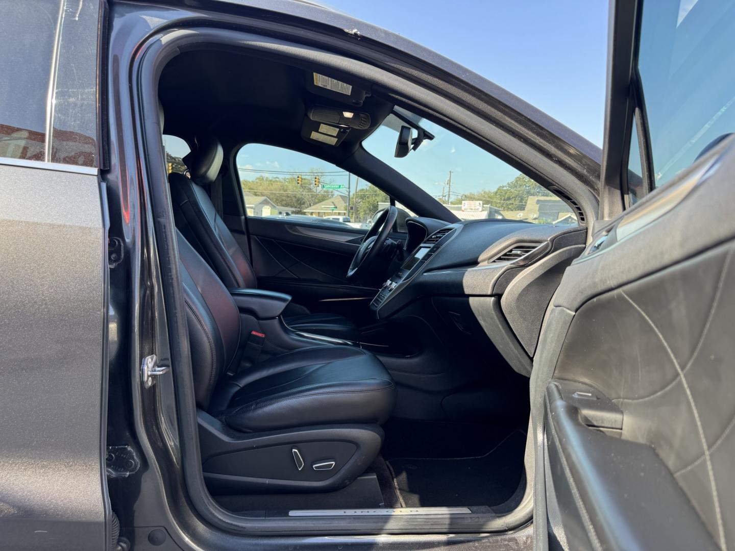 2017 GRAY LINCOLN MKC PREMIER (5LMCJ1D90HU) , located at 5900 E. Lancaster Ave., Fort Worth, TX, 76112, (817) 457-5456, 0.000000, 0.000000 - Step into luxury with this 2017 Lincoln MKC Premier, where comfort and technology come together in a sleek, compact SUV. This vehicle is loaded with premium features designed to make every drive enjoyable. Push to Start Leather Interior Heated Front Seats Backup Camera Dual-Zone Climate- Photo#16
