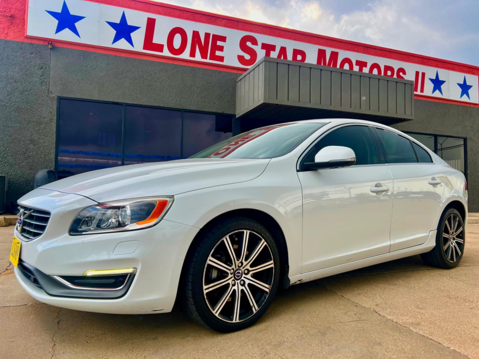 2014 WHITE VOLVO S60 T5 (YV1612FS1E2) , located at 5900 E. Lancaster Ave., Fort Worth, TX, 76112, (817) 457-5456, 0.000000, 0.000000 - This is a 2014 VOLVO S60 T5 4 DOOR SEDAN that is in excellent condition. There are no dents or scratches. The interior is clean with no rips or tears or stains. All power windows, door locks and seats. Ice cold AC for those hot Texas summer days. It is equipped with a CD player, AM/FM radio, AUX por - Photo #1