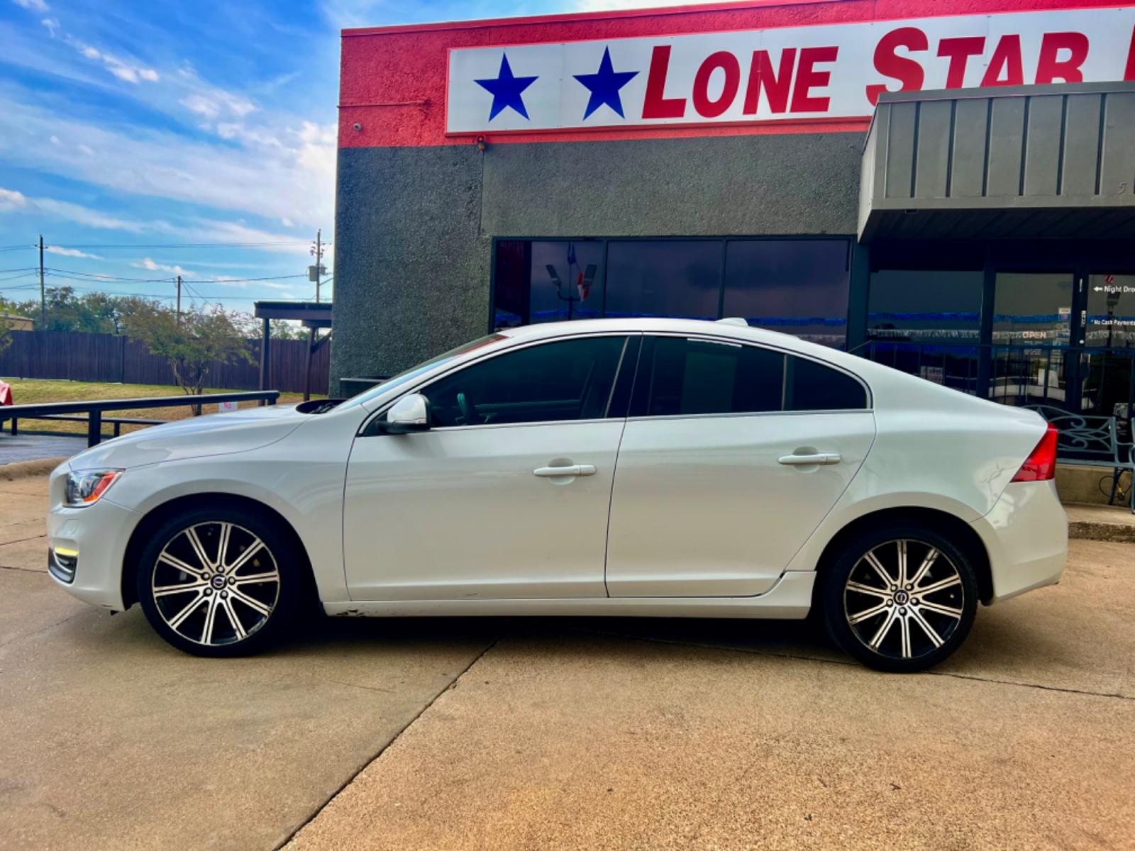 2014 WHITE VOLVO S60 T5 (YV1612FS1E2) , located at 5900 E. Lancaster Ave., Fort Worth, TX, 76112, (817) 457-5456, 0.000000, 0.000000 - This is a 2014 VOLVO S60 T5 4 DOOR SEDAN that is in excellent condition. There are no dents or scratches. The interior is clean with no rips or tears or stains. All power windows, door locks and seats. Ice cold AC for those hot Texas summer days. It is equipped with a CD player, AM/FM radio, AUX por - Photo #3