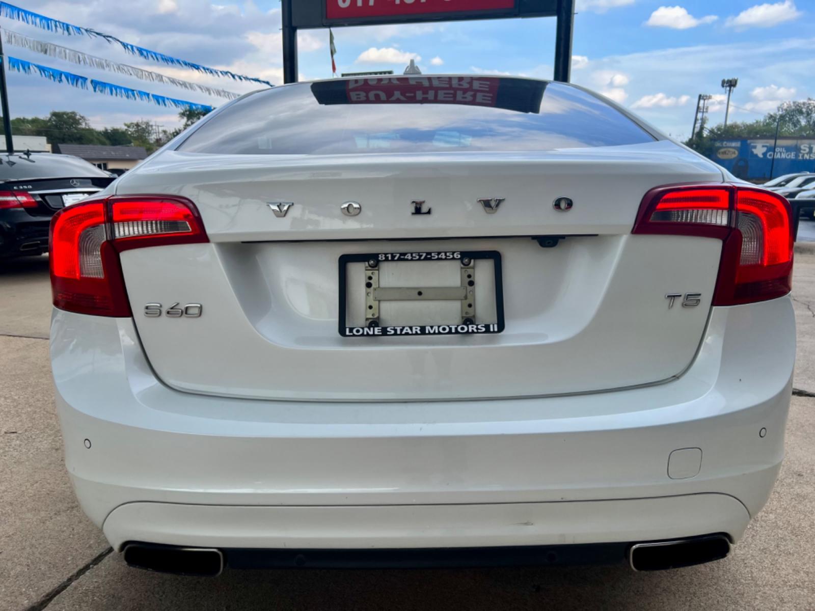 2014 WHITE VOLVO S60 T5 (YV1612FS1E2) , located at 5900 E. Lancaster Ave., Fort Worth, TX, 76112, (817) 457-5456, 0.000000, 0.000000 - This is a 2014 VOLVO S60 T5 4 DOOR SEDAN that is in excellent condition. There are no dents or scratches. The interior is clean with no rips or tears or stains. All power windows, door locks and seats. Ice cold AC for those hot Texas summer days. It is equipped with a CD player, AM/FM radio, AUX por - Photo #5
