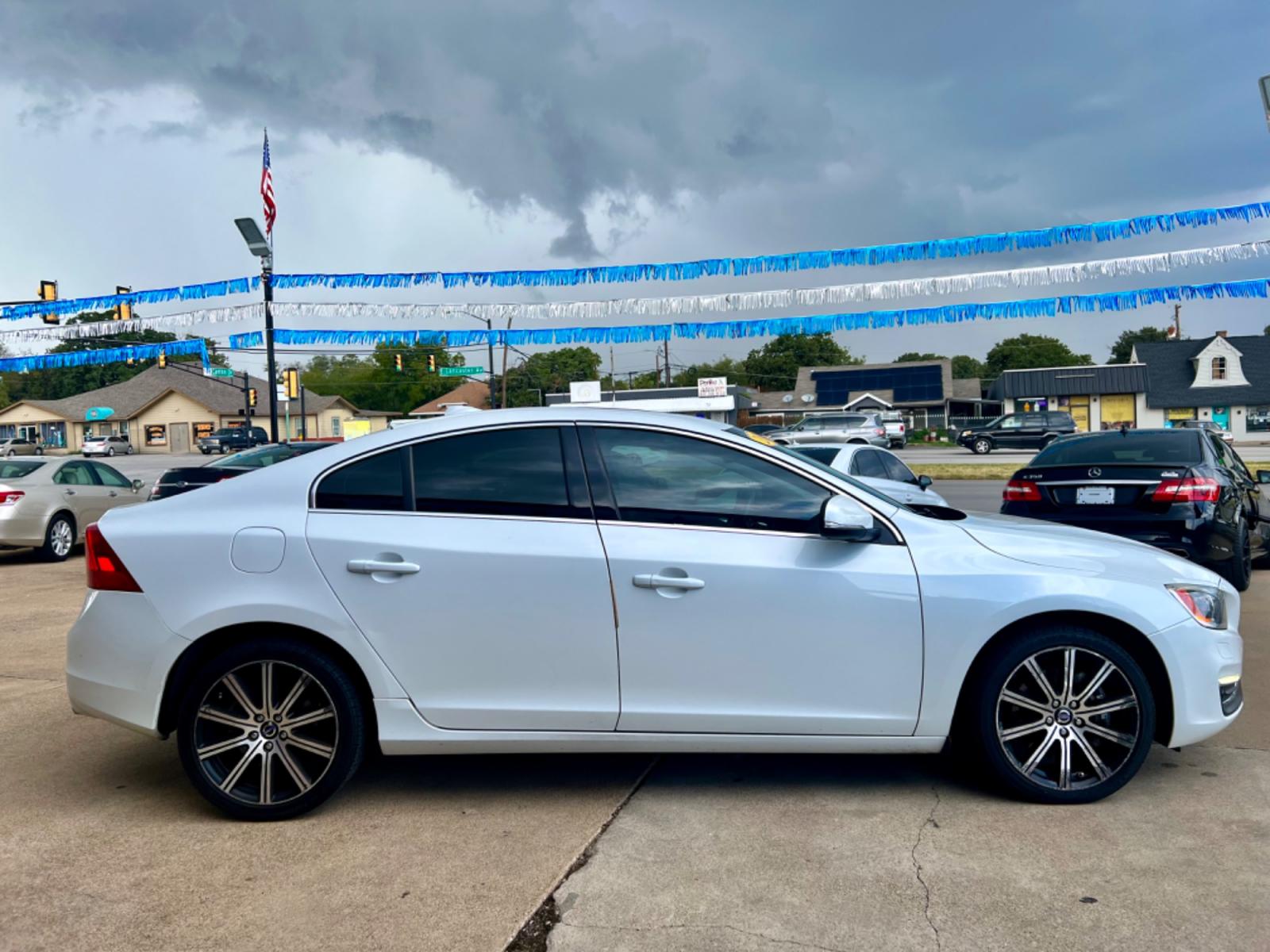 2014 WHITE VOLVO S60 T5 (YV1612FS1E2) , located at 5900 E. Lancaster Ave., Fort Worth, TX, 76112, (817) 457-5456, 0.000000, 0.000000 - This is a 2014 VOLVO S60 T5 4 DOOR SEDAN that is in excellent condition. There are no dents or scratches. The interior is clean with no rips or tears or stains. All power windows, door locks and seats. Ice cold AC for those hot Texas summer days. It is equipped with a CD player, AM/FM radio, AUX por - Photo #7