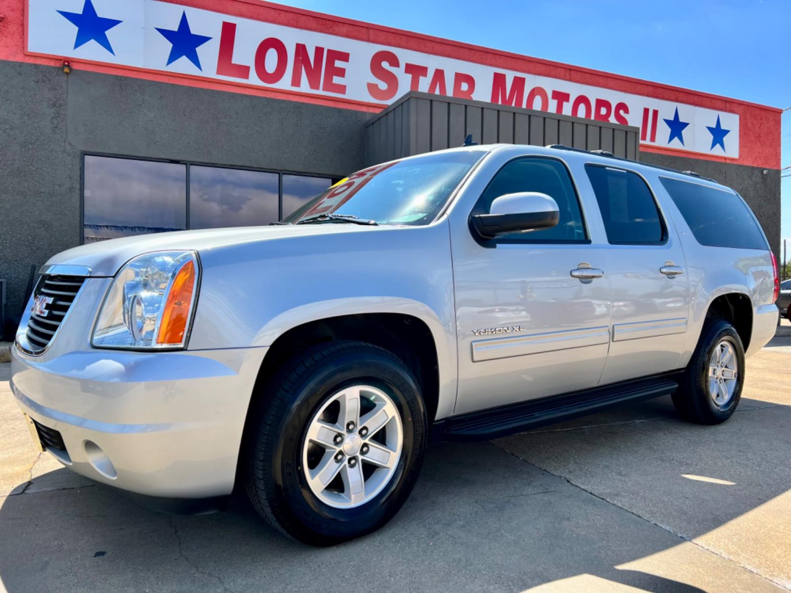2013 SILVER GMC YUKON XL SLT1 (1GKS2KE78DR) , located at 5900 E. Lancaster Ave., Fort Worth, TX, 76112, (817) 457-5456, 0.000000, 0.000000 - This is a 2013 GMC YUKON XL SLT1 4 DOOR SUV that is in excellent condition. There are no dents or scratches. The interior is clean with no rips or tears or stains. All power windows, door locks and seats. Ice cold AC for those hot Texas summer days. It is equipped with a CD player, AM/FM radio, AUX - Photo #1