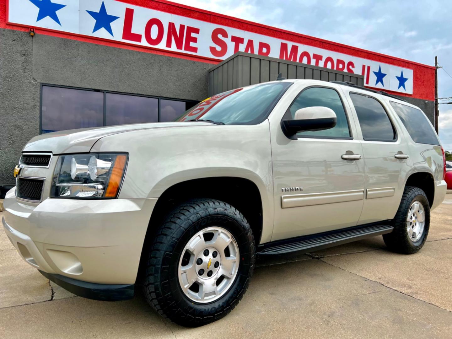 2014 GOLD CHEVROLET TAHOE LS (1GNSCAE04ER) , located at 5900 E. Lancaster Ave., Fort Worth, TX, 76112, (817) 457-5456, 0.000000, 0.000000 - This is a 2014 CHEVROLET TAHOE LS 4 DOOR SUV that is in excellent condition. There are no dents or scratches. The interior is clean with no rips or tears or stains. All power windows, door locks and seats. Ice cold AC for those hot Texas summer days. It is equipped with a CD player, AM/FM radio, AUX - Photo#0