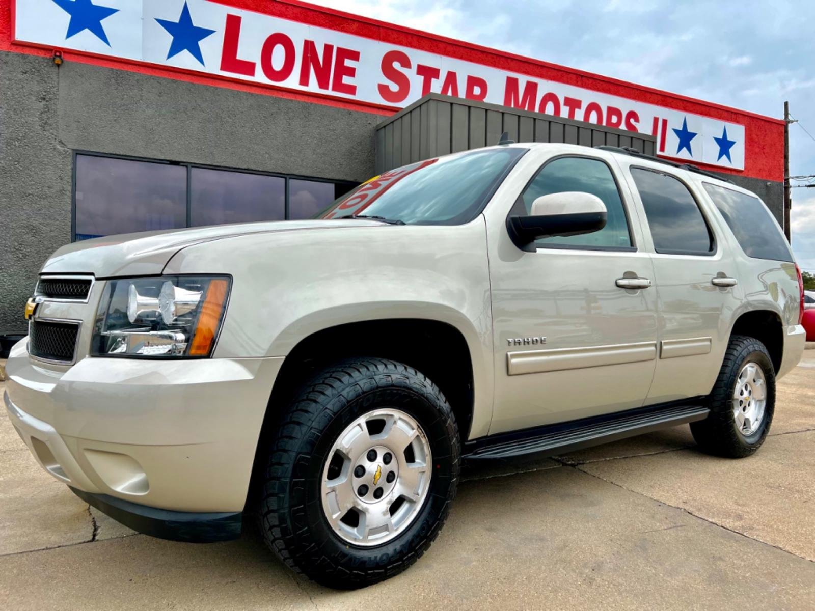 2014 GOLD CHEVROLET TAHOE LS (1GNSCAE04ER) , located at 5900 E. Lancaster Ave., Fort Worth, TX, 76112, (817) 457-5456, 0.000000, 0.000000 - This is a 2014 CHEVROLET TAHOE LS 4 DOOR SUV that is in excellent condition. There are no dents or scratches. The interior is clean with no rips or tears or stains. All power windows, door locks and seats. Ice cold AC for those hot Texas summer days. It is equipped with a CD player, AM/FM radio, AUX - Photo #1