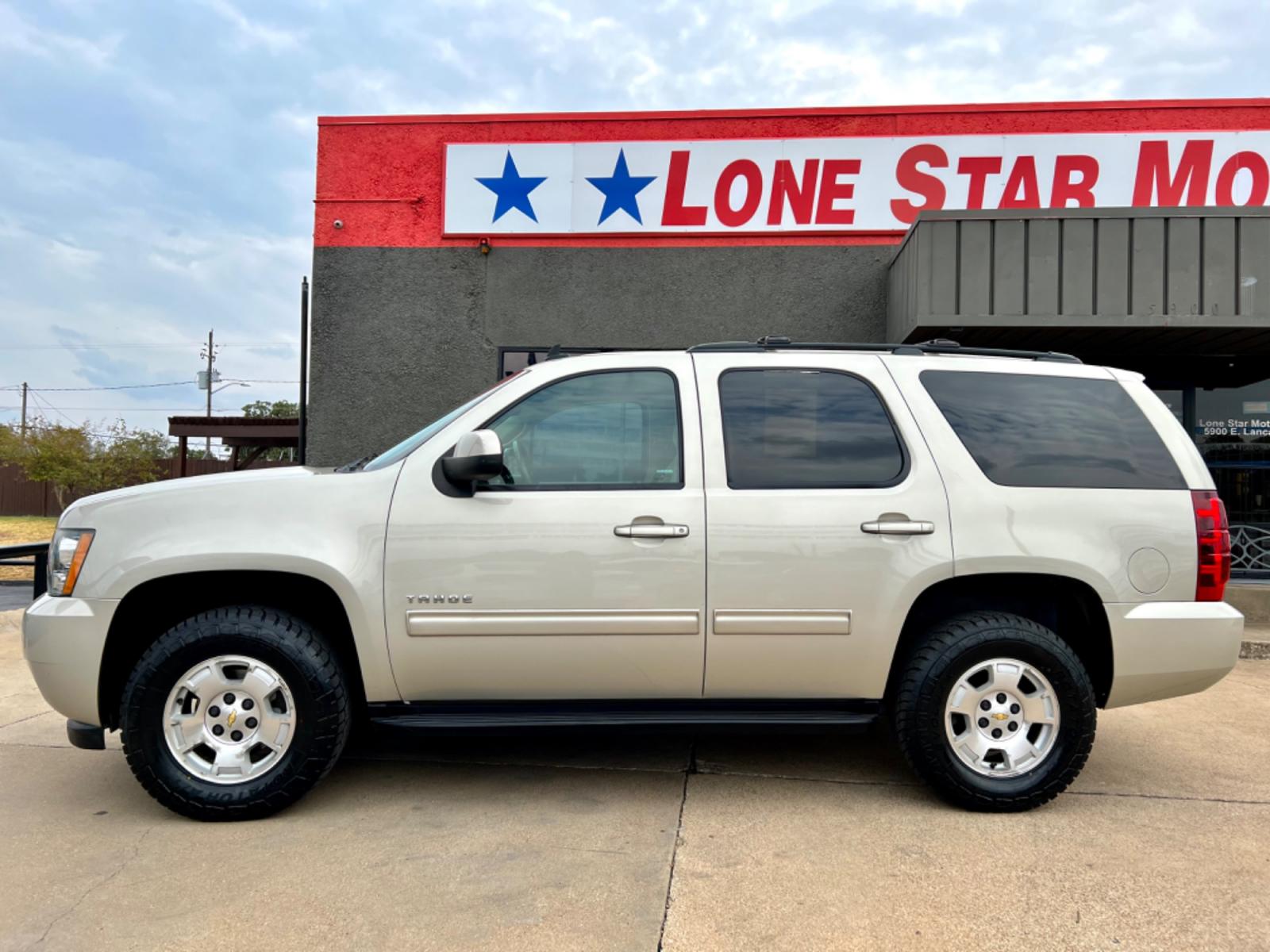 2014 GOLD CHEVROLET TAHOE LS (1GNSCAE04ER) , located at 5900 E. Lancaster Ave., Fort Worth, TX, 76112, (817) 457-5456, 0.000000, 0.000000 - This is a 2014 CHEVROLET TAHOE LS 4 DOOR SUV that is in excellent condition. There are no dents or scratches. The interior is clean with no rips or tears or stains. All power windows, door locks and seats. Ice cold AC for those hot Texas summer days. It is equipped with a CD player, AM/FM radio, AUX - Photo #3