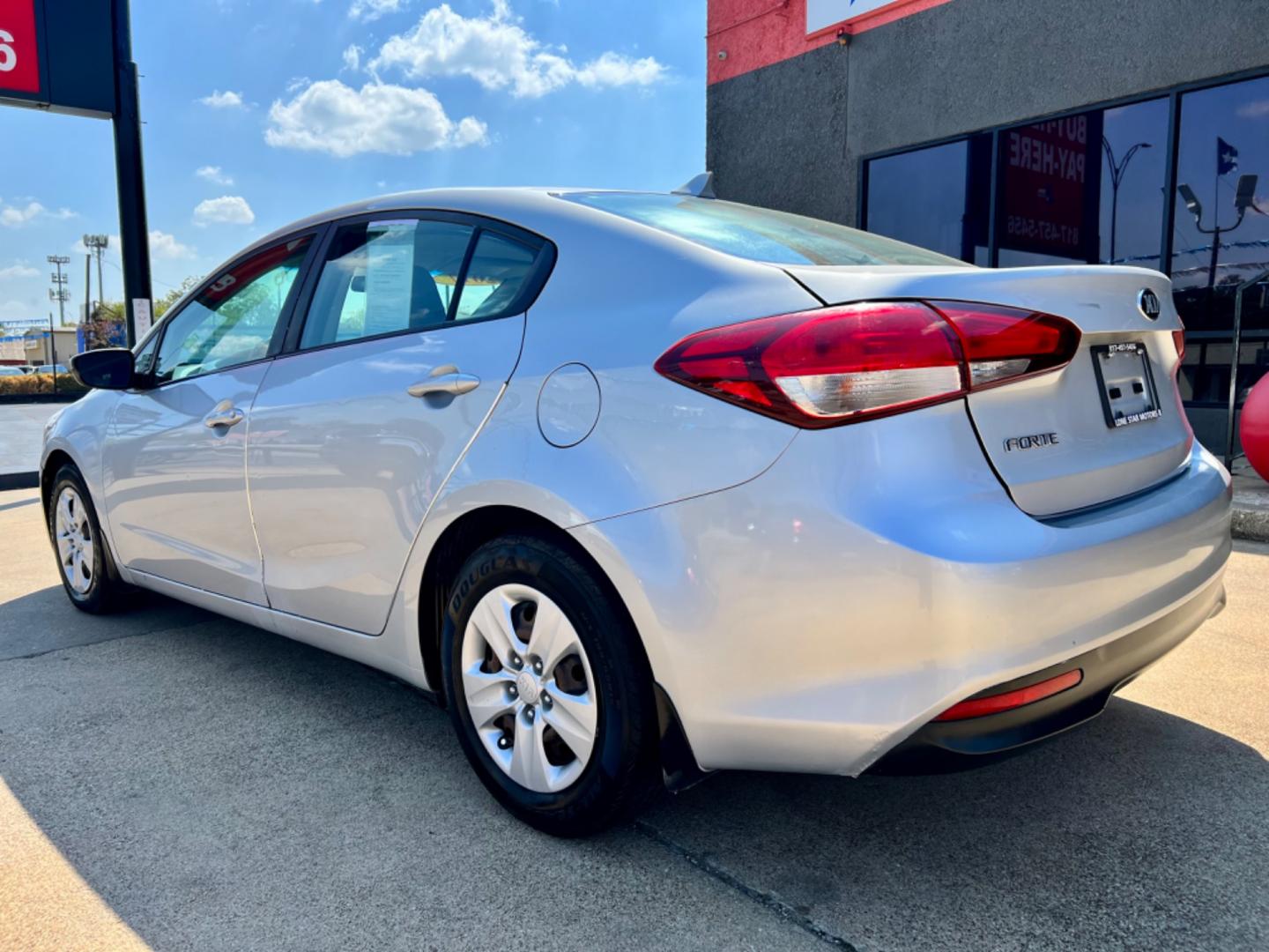 2017 GRAY KIA FORTE LX (3KPFK4A77HE) , located at 5900 E. Lancaster Ave., Fort Worth, TX, 76112, (817) 457-5456, 0.000000, 0.000000 - This is a 2017 KIA FORTE LX 4 DOOR SEDAN that is in excellent condition. There are no dents or scratches. The interior is clean with no rips or tears or stains. All power windows, door locks and seats. Ice cold AC for those hot Texas summer days. It is equipped with a CD player, AM/FM radio, AUX por - Photo#4