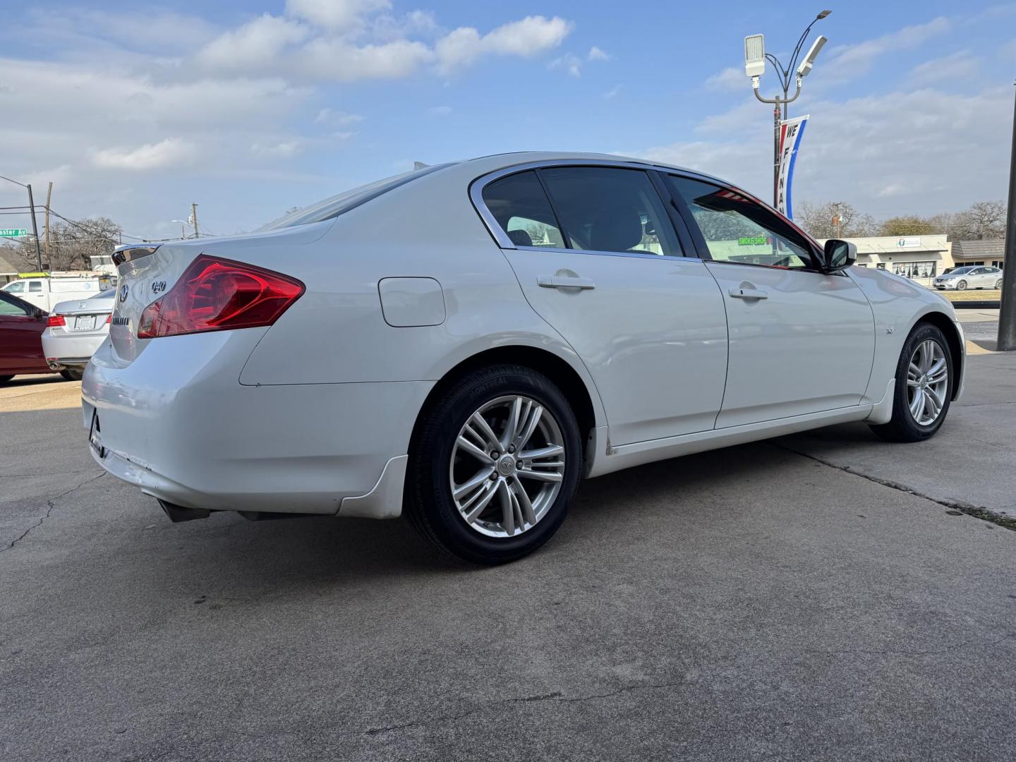 2015 WHITE INFINITI Q40 BASE (JN1CV6AR0FM) , located at 5900 E. Lancaster Ave., Fort Worth, TX, 76112, (817) 457-5456, 0.000000, 0.000000 - This is a 2015 INFINITI Q40 BASE 4 DOOR SEDAN that is in excellent condition. There are no dents or scratches. The interior is clean with no rips or tears or stains. All power windows, door locks and seats. Ice cold AC for those hot Texas summer days. It is equipped with a CD player, AM/FM radio, AU - Photo#3